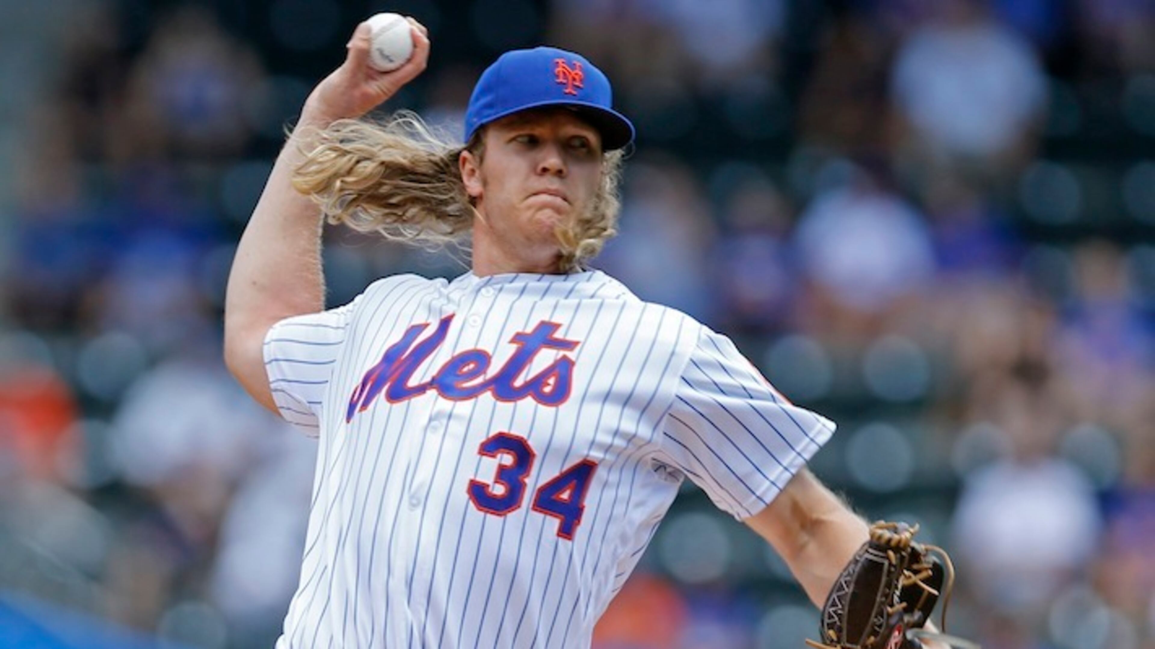 In this June 22, 2016, file photo, New York Mets starting pitcher Noah Syndergaard (34) delivers during the first inning of an interleague baseball game against the Kansas City Royals, in New York. With all those 100 mph fastballs flying through the strike zone these days from Aroldis Chapman, Noah Syndergaard and others, flame-throwers are the norm rather than the exception — in rotations and bullpens alike. (AP Photo/Kathy Willens, File)