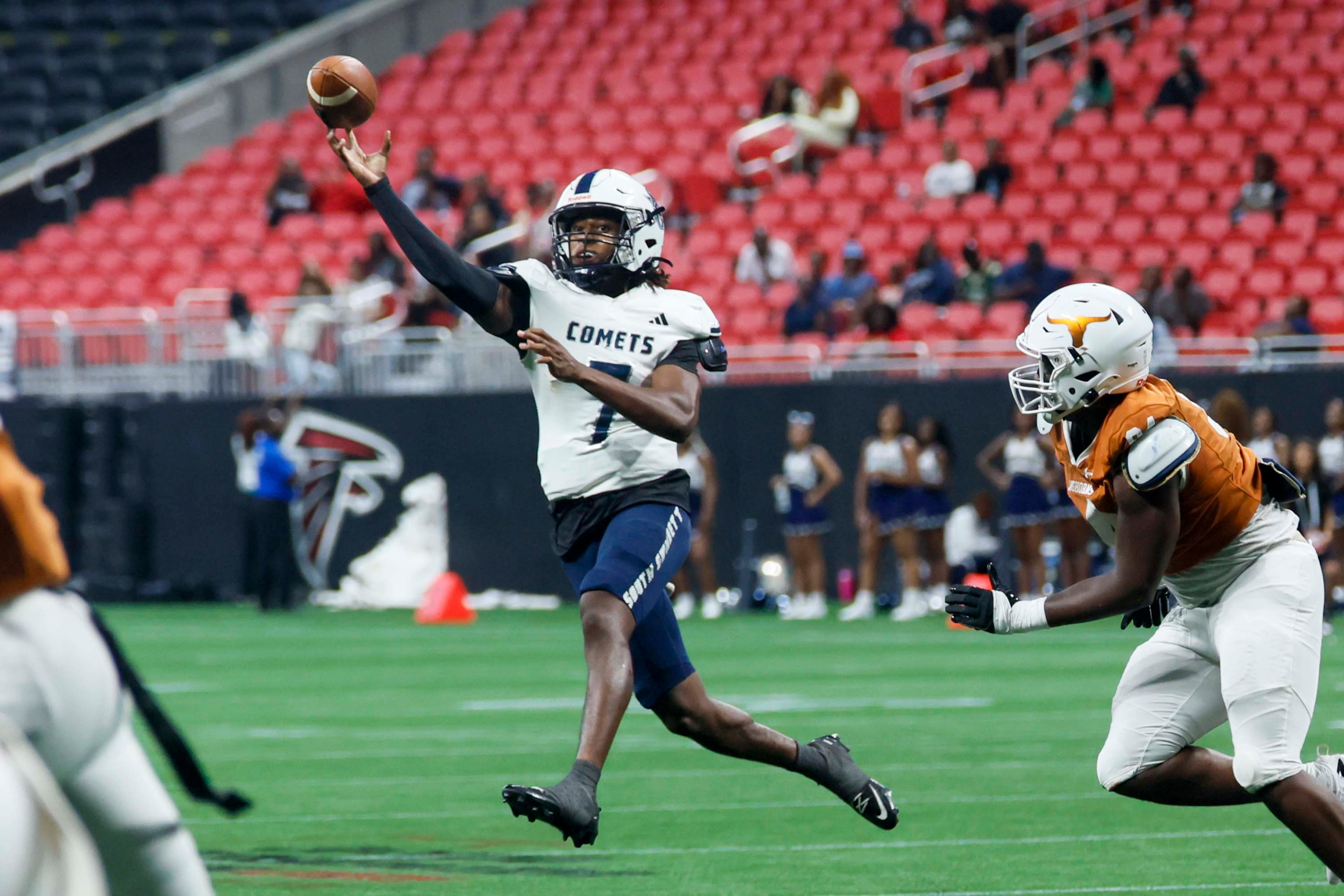 South Gwinnett quarterback CJ Peoples (7) attempts a pass in the first half against Lanier at the Corky Kell + Dave Hunter Classic on Wednesday, August 12, 2026, at Mercedes-Benz Stadium in Atlanta. (Miguel Martinez/AJC)
