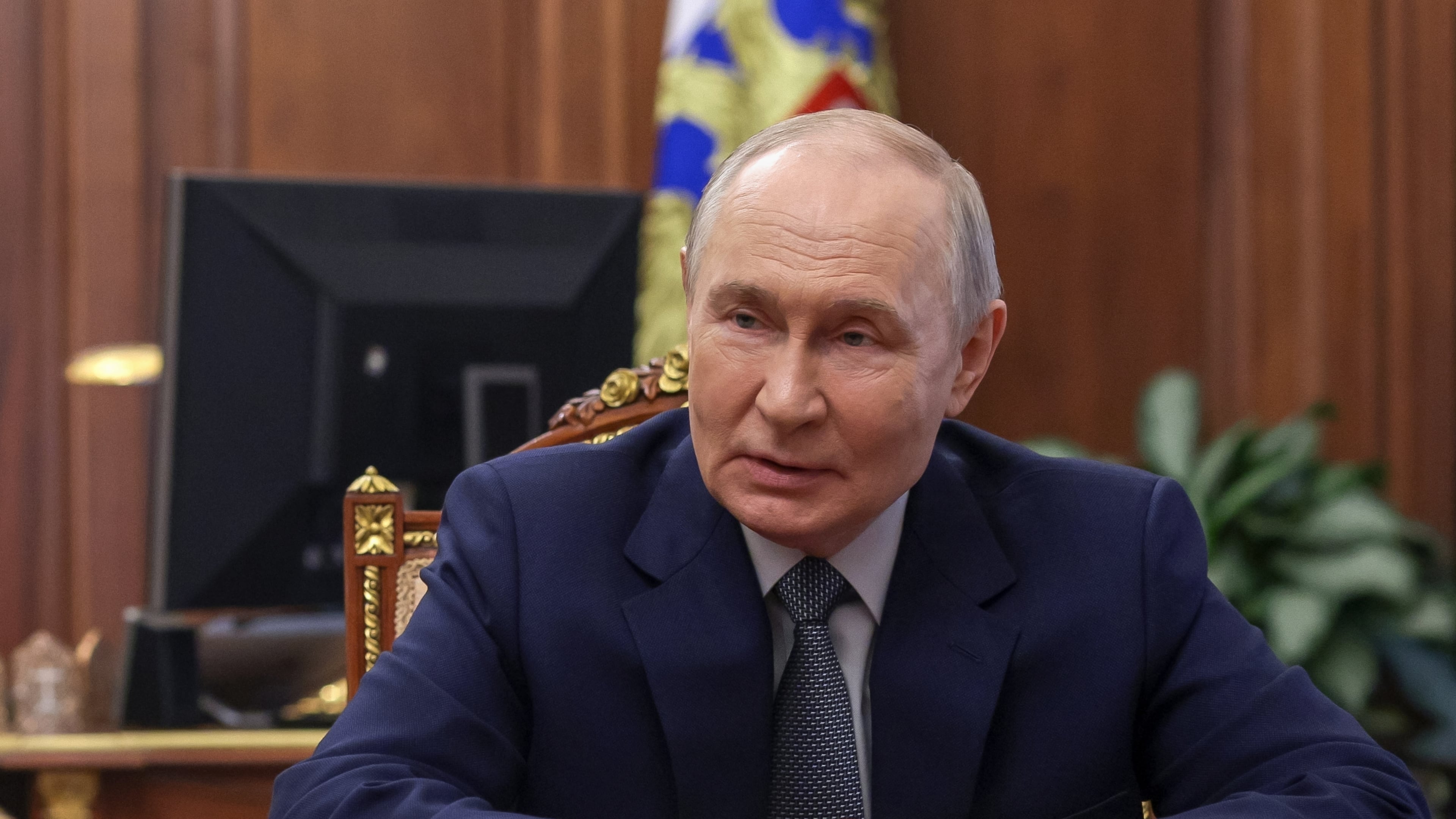 Russian President Vladimir Putin listens to Head of the Republic of Mordovia Artyom Zdunov at the Kremlin in Moscow, Monday, May 4, 2026. (Mikhail Metzel/Sputnik, Kremlin Pool Photo via AP)