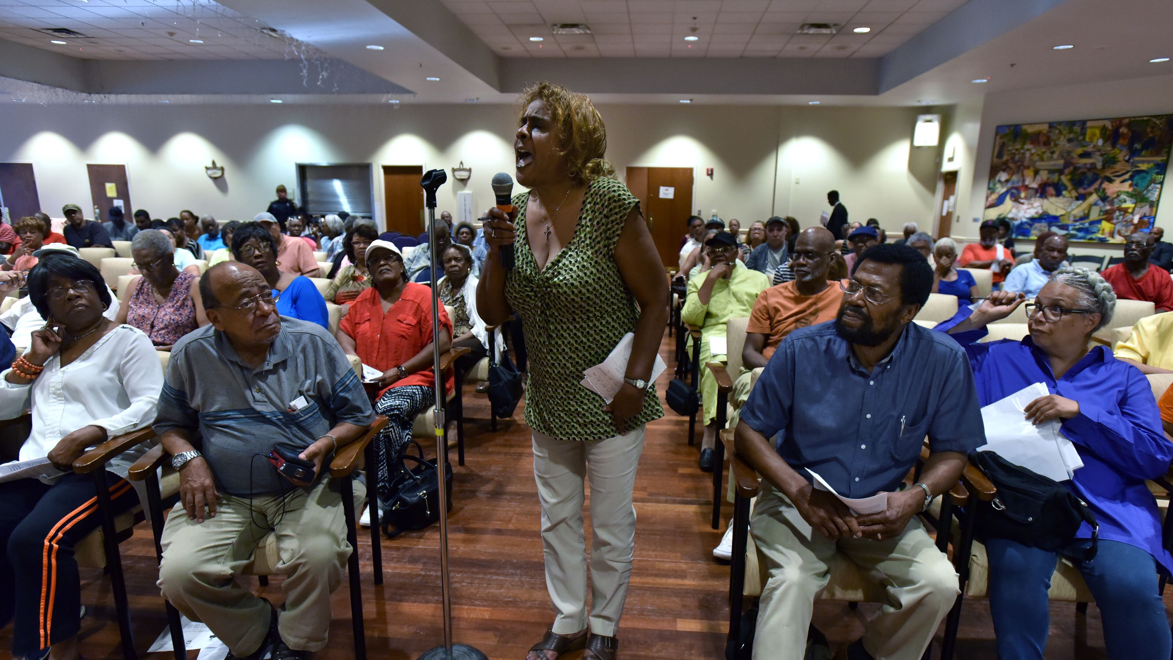 Fulton County resident Dorothy Hart expresses her concern during an Emergency Town Hall Meeting to discuss property tax assessments, June 13, 2017. (AJC Photo / Hyosub Shin)