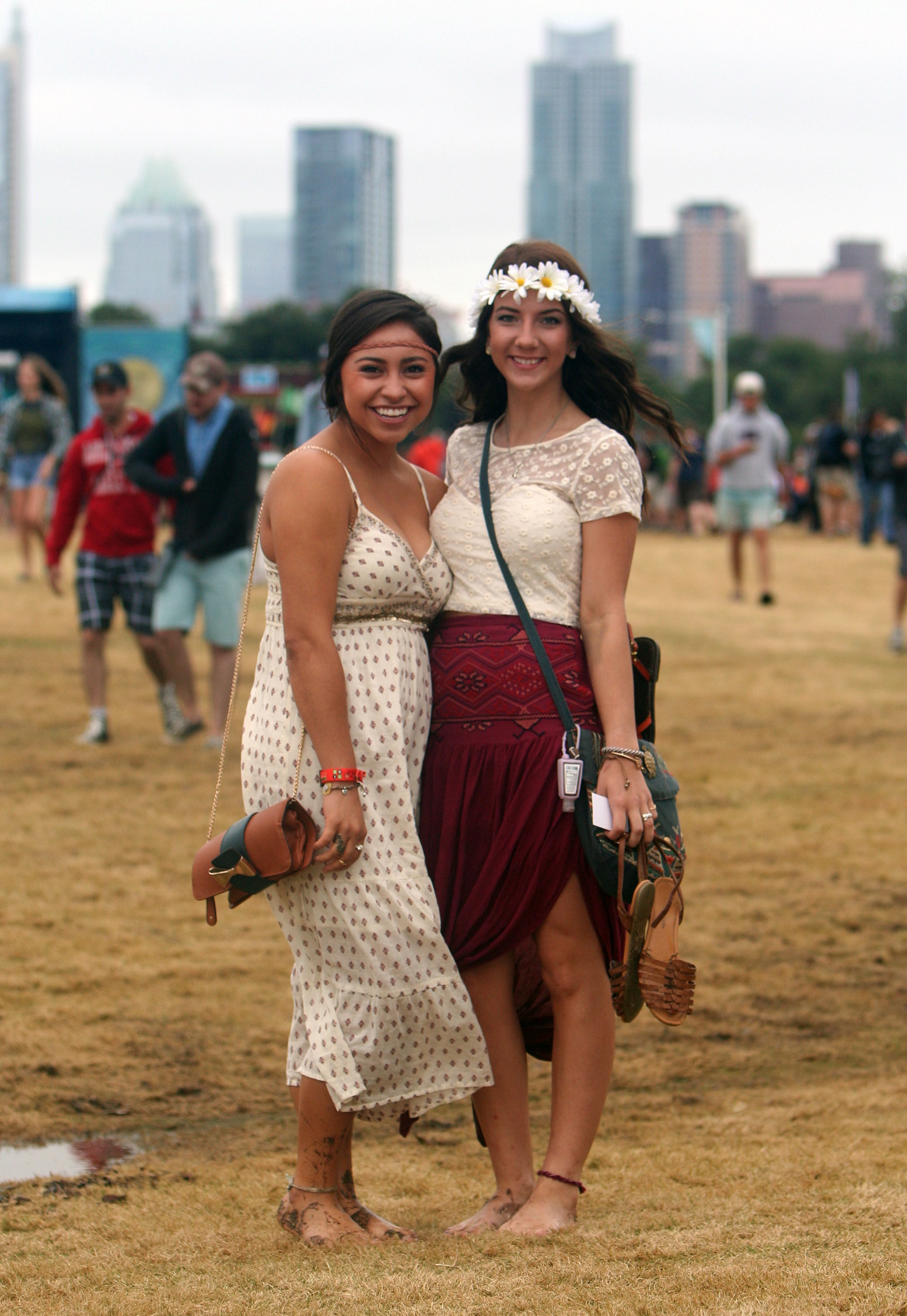 Bethanie Hernandez and Madison Pechacek of College Station at soggy Austin City Limits Music Festival, 10.11.14 MARCIAL GUAJARDO/ROUND ROCK LEADER