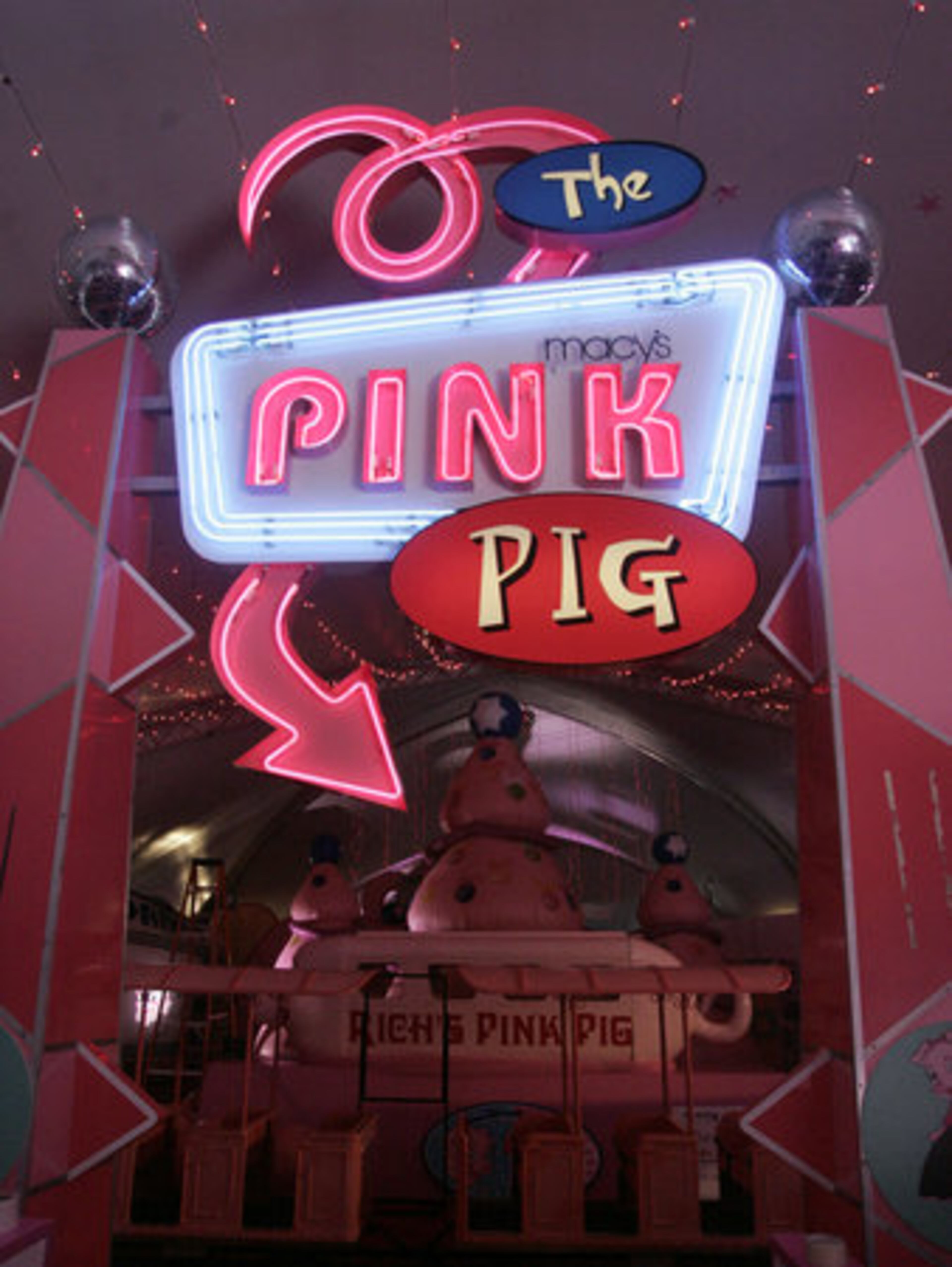 A neon sign points children and their parents to the ride, which has been an Atlanta holiday tradition since 1953.