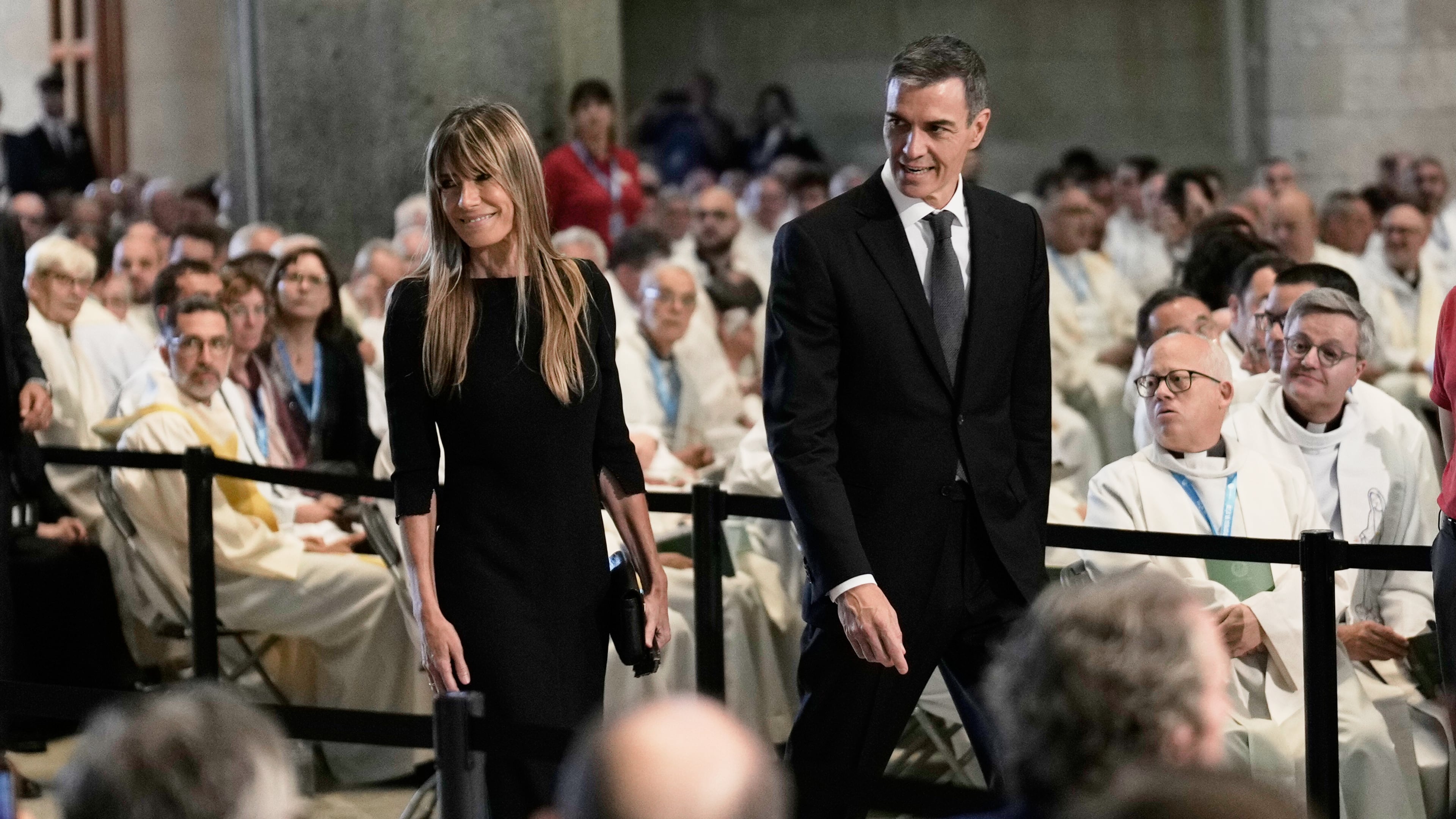 Spain's Prime Minister Pedro Sanchez and his wife Begona Gomez arrive before a Mass celebrated by Pope Leo XIV at the Basilica of the Sagrada Familia in Barcelona, Spain, Wednesday, June 10, 2026. (AP Photo/Bernat Armangue)