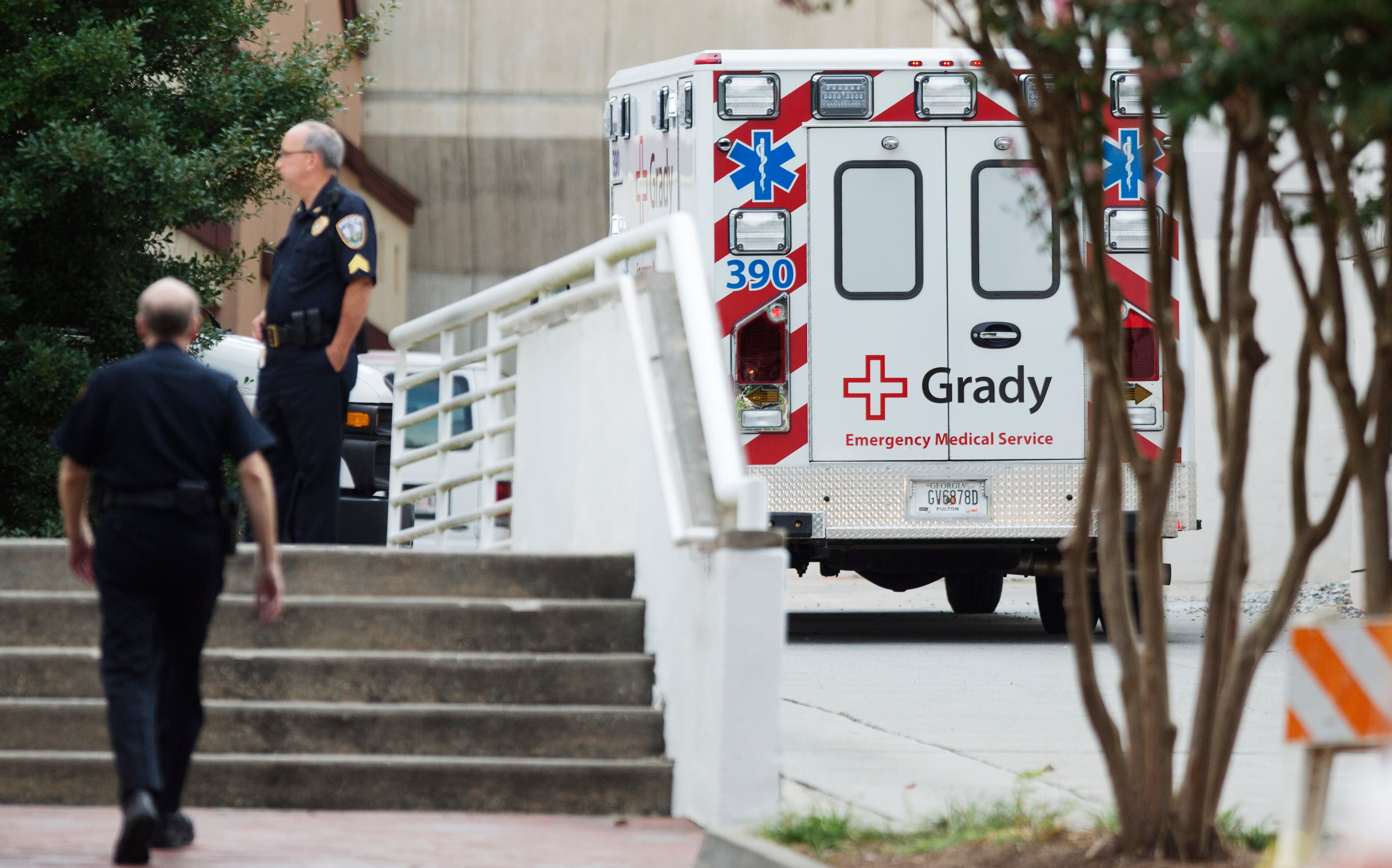 An ambulance transporting an ebola patient arrives at Emory University Hospital for treatment, Tuesday, Sept. 9, 2014, in Atlanta. The fourth American aid worker sickened with the Ebola virus arrived Tuesday morning for treatment at Emory University Hospital, where two others have been successfully treated. (AP Photo/David Goldman)