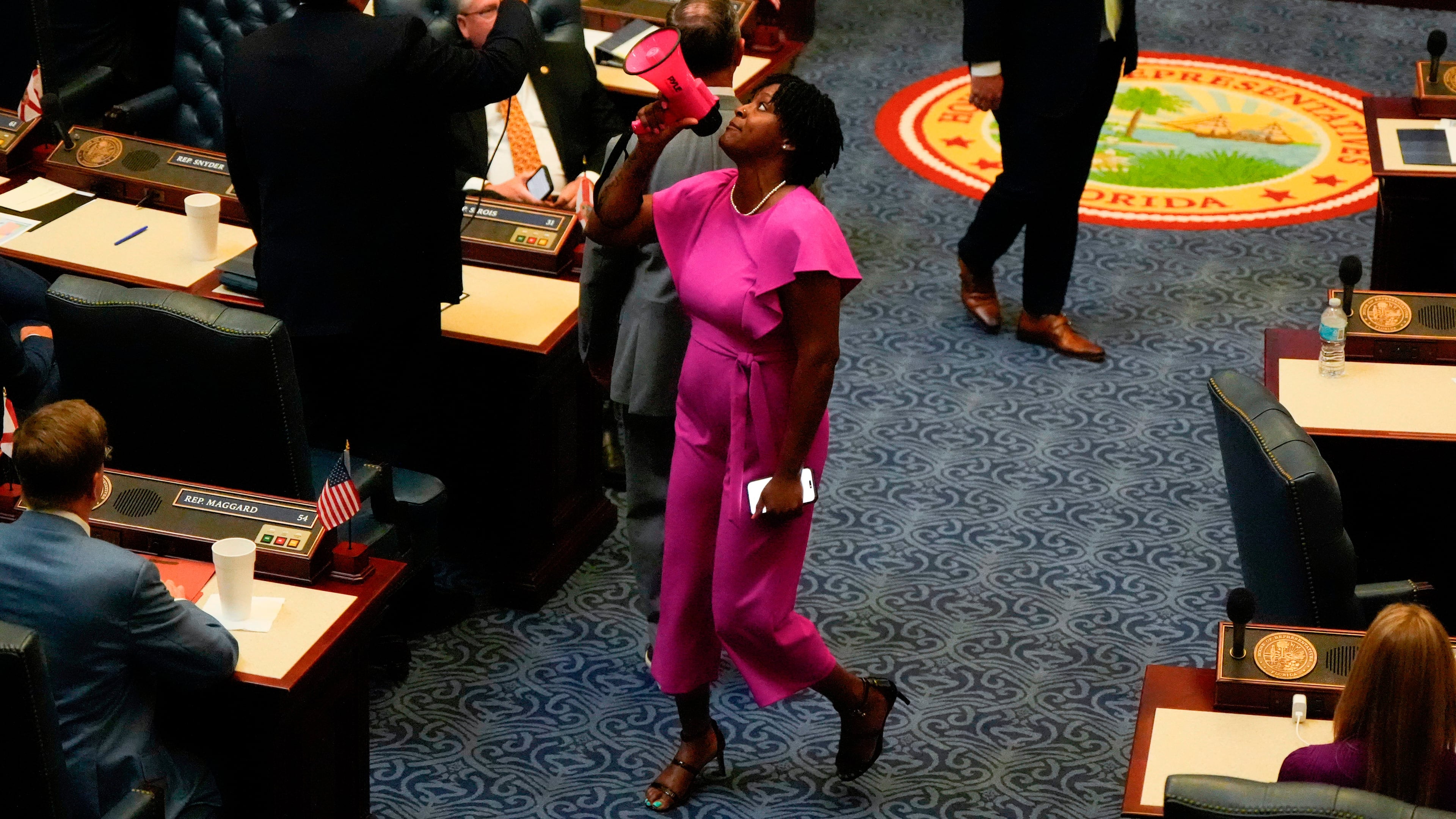 FILE - State Rep. Angie Nixon, D-Fla., speaks loudly on the House floor as the House votes on HB1D, a redistricting bill, during a special session of the Florida Legislature, April 29, 2026, in Tallahassee, Fla. (AP Photo/Mike Stewart, File)