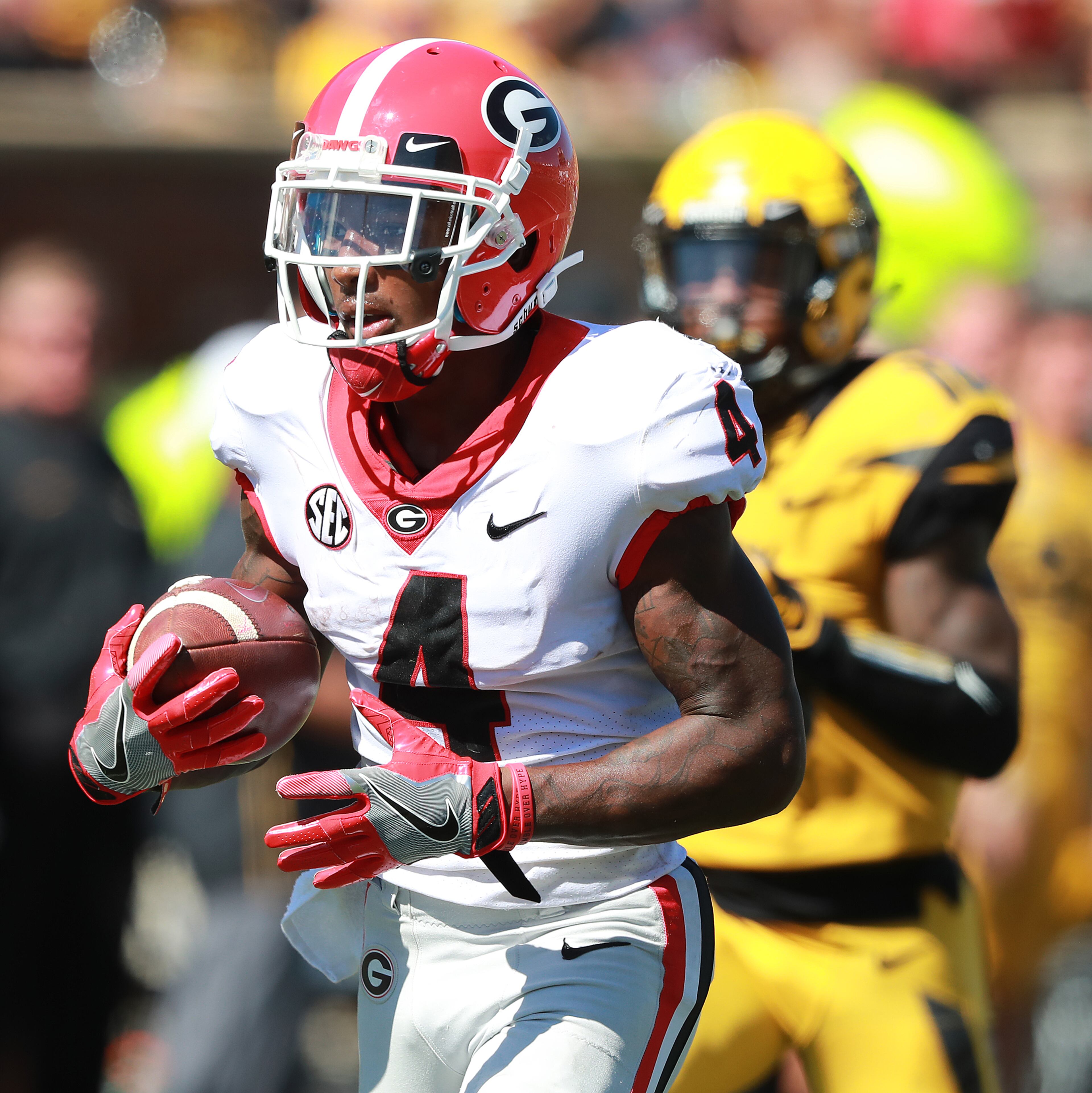 September 22, 2018 Columbia: Georgia wide receiver Mecole Hardman catches a 40-plus yard touchdown pass from Jake Fromm for a 40-22 lead over Mizzou during the fourth quarter in a NCAA college football game on Saturday, Sept 22, 2018, in Columbia. Curtis Compton/ccompton@ajc.com