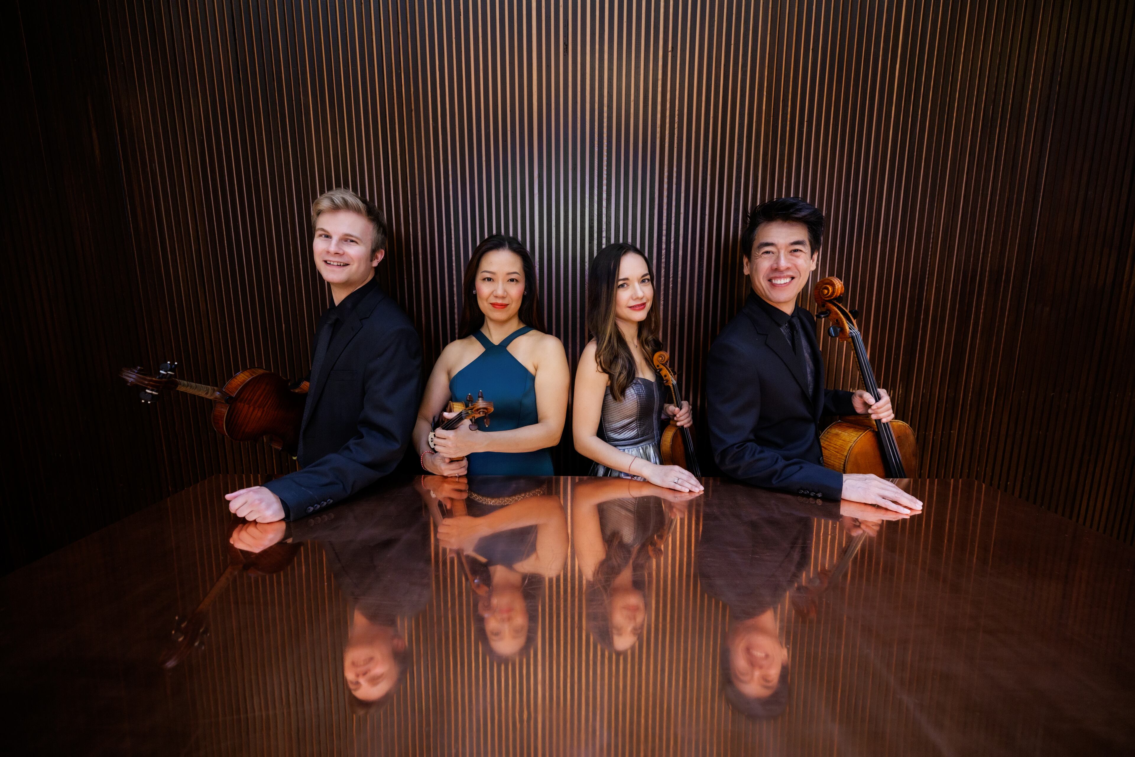 The new Vega Quartet -- Joseph Skerik (from left), Jessica Shuang Wu, Emily Daggatt Smith and Guang Wang -- performs at the First Presbyterian Church of Atlanta and St. Luke's Episcopal Church. (Photo by Fernando Decillis)