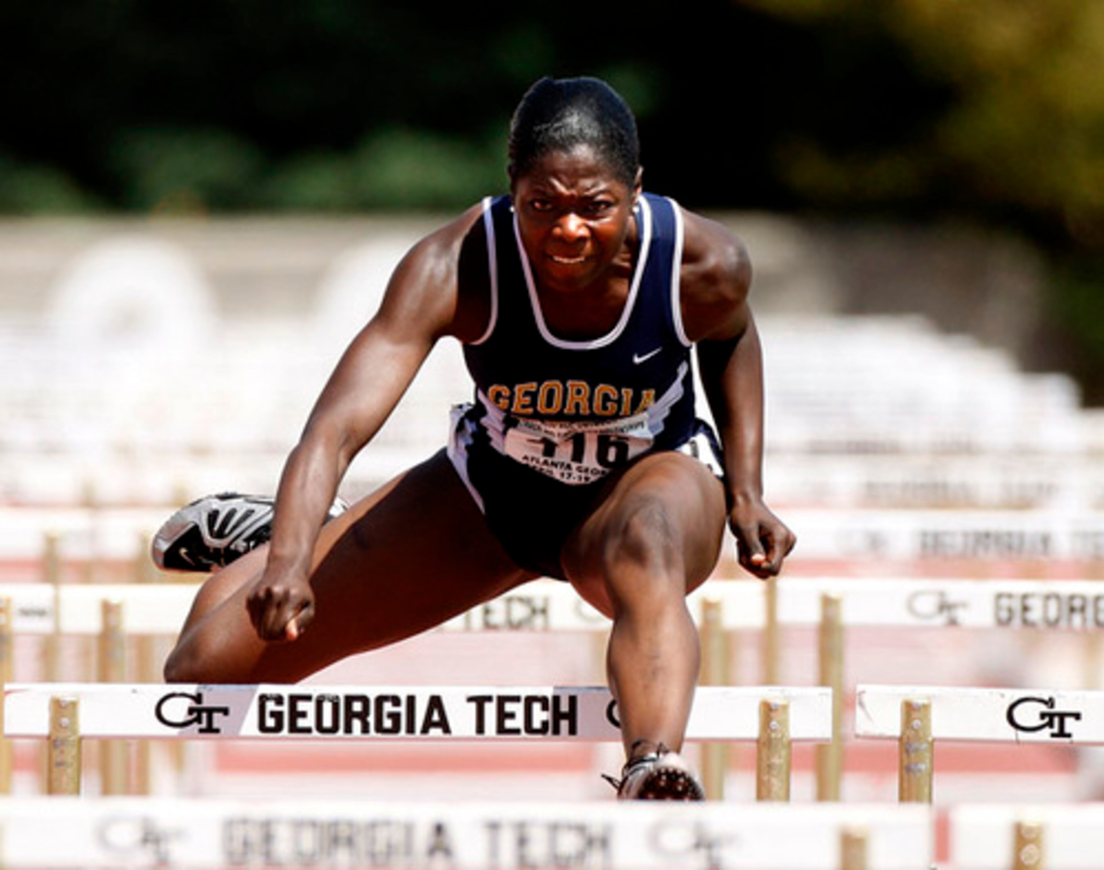Georgia Tech's Shantia Moss clears a hurdle during the third heat of the womens 110 event at Friday's ACC Outdoor Track & Field Championship in Atlanta. She finished second and goes on to Saturday's finals.