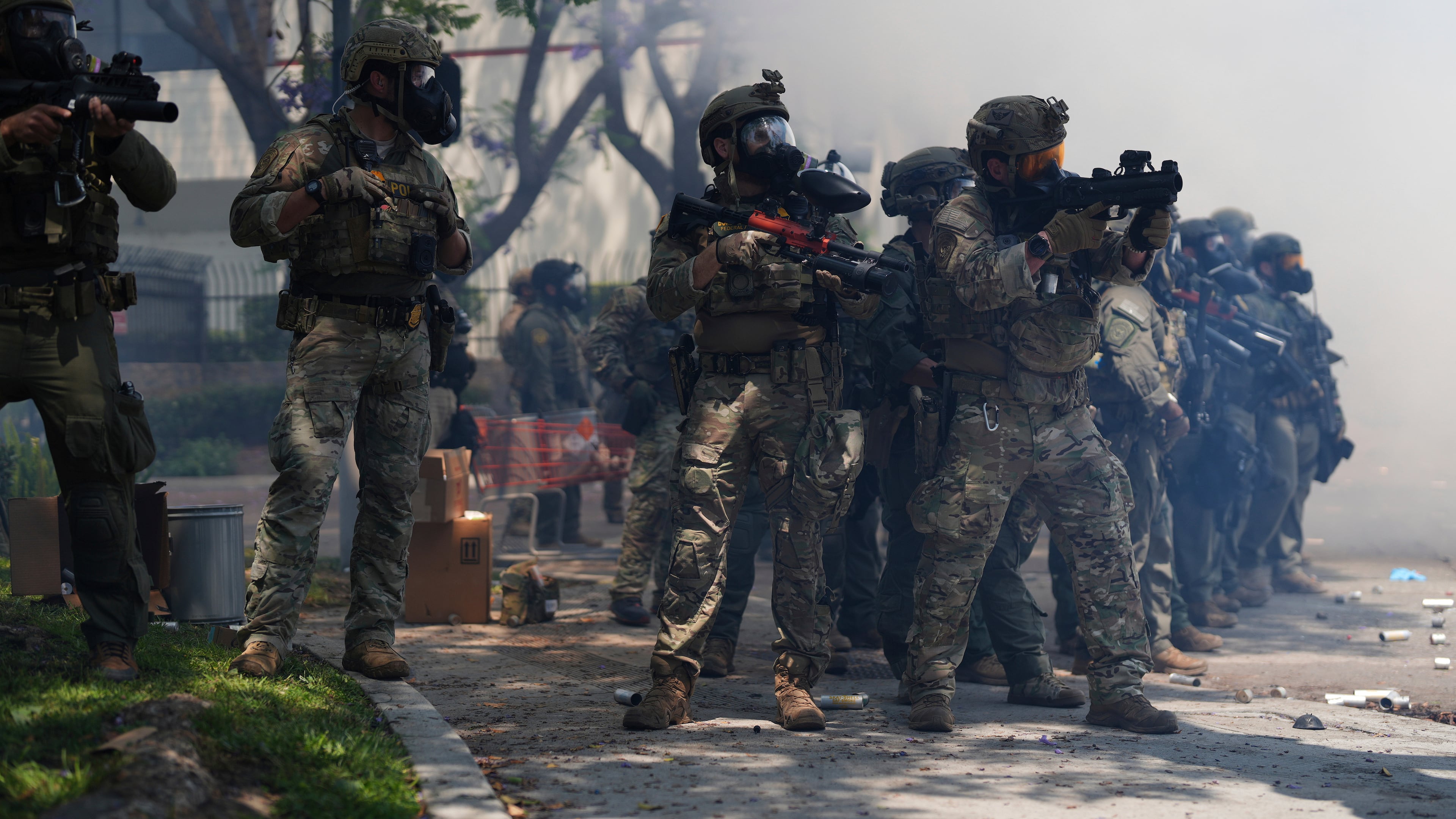 FILE - Law enforcement respond to protesters after federal immigration authorities conducted operations, June 7, 2025, in Paramount, Calif. (AP Photo/Eric Thayer, File)