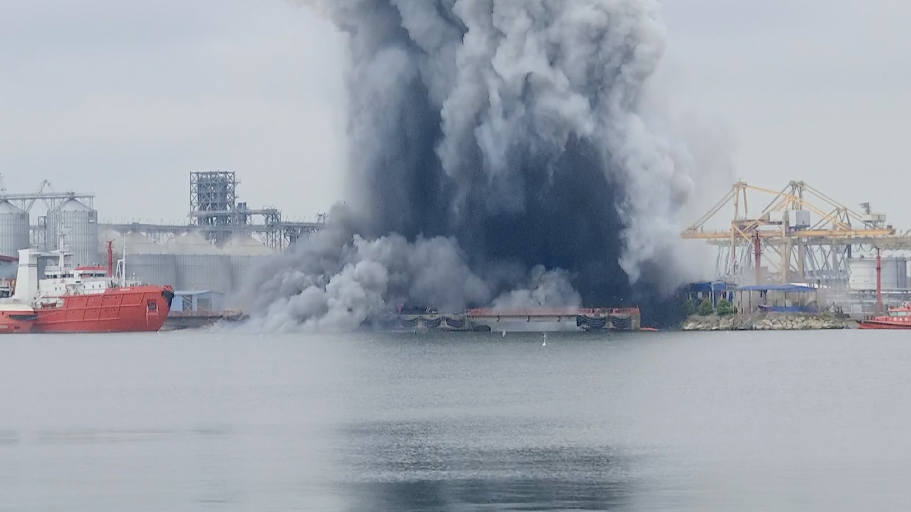 In this photo taken from video provided by OBSERVATOR ANTENA 1, an explosion of sea drone is seen in Constanta port, Romania, Friday, June 5, 2026. (OBSERVATOR ANTENA 1 via AP)