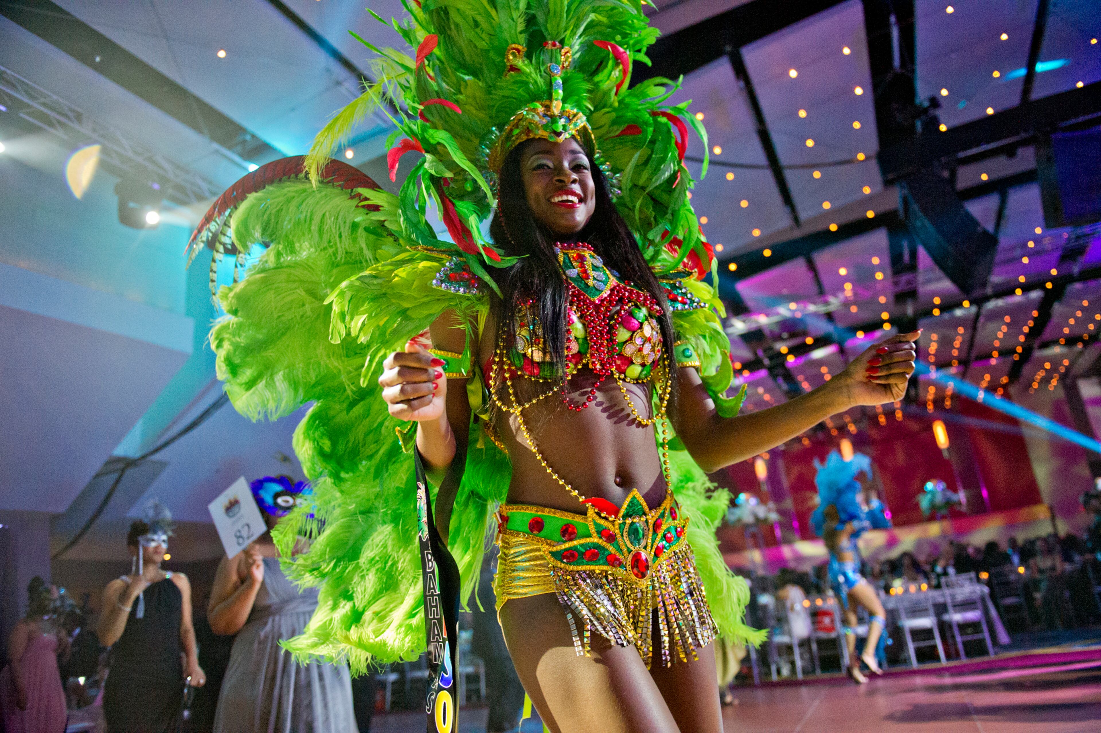 December 20, 2014 Atlanta - Celeste Marshall leads the Parade of Masks during the 31st annual United Negro College Fund Mayor's Masked Ball at the Atlanta Marriott Marquis in downtown on Saturday, December 20, 2014. 1,300 guests attended the event which raised over one million dollars for the organization. JONATHAN PHILLIPS / SPECIAL