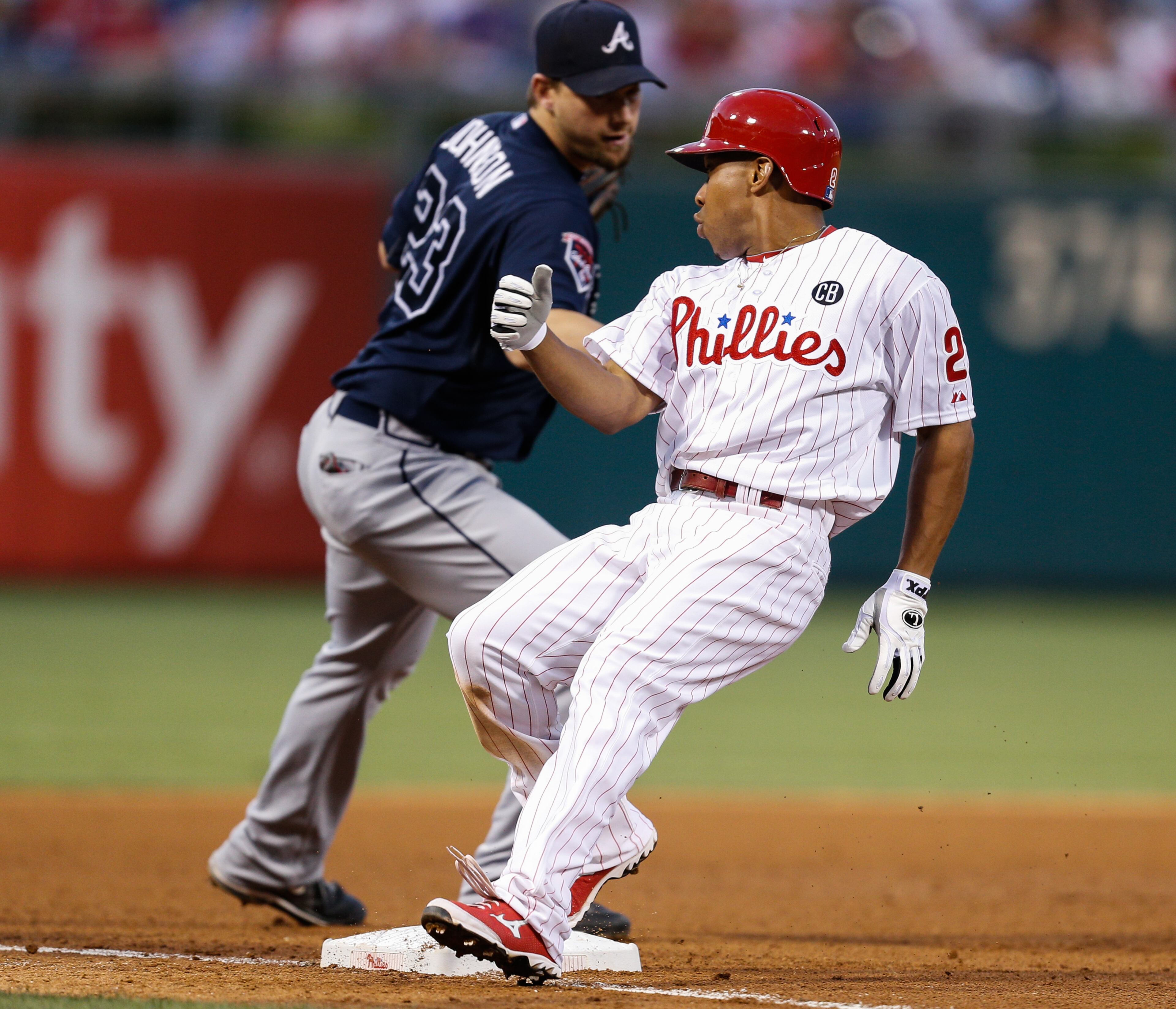 PHILADELPHIA, PA - JUNE 27: Ben Revere #2 of the Philadelphia Phillies is safe on third for a triple beating the tag by Chris Johnson #23 of the Atlanta Braves in the fourth inning of the game at Citizens Bank Park on June 27, 2014 in Philadelphia, Pennsylvania. (Photo by Brian Garfinkel/Getty Images)