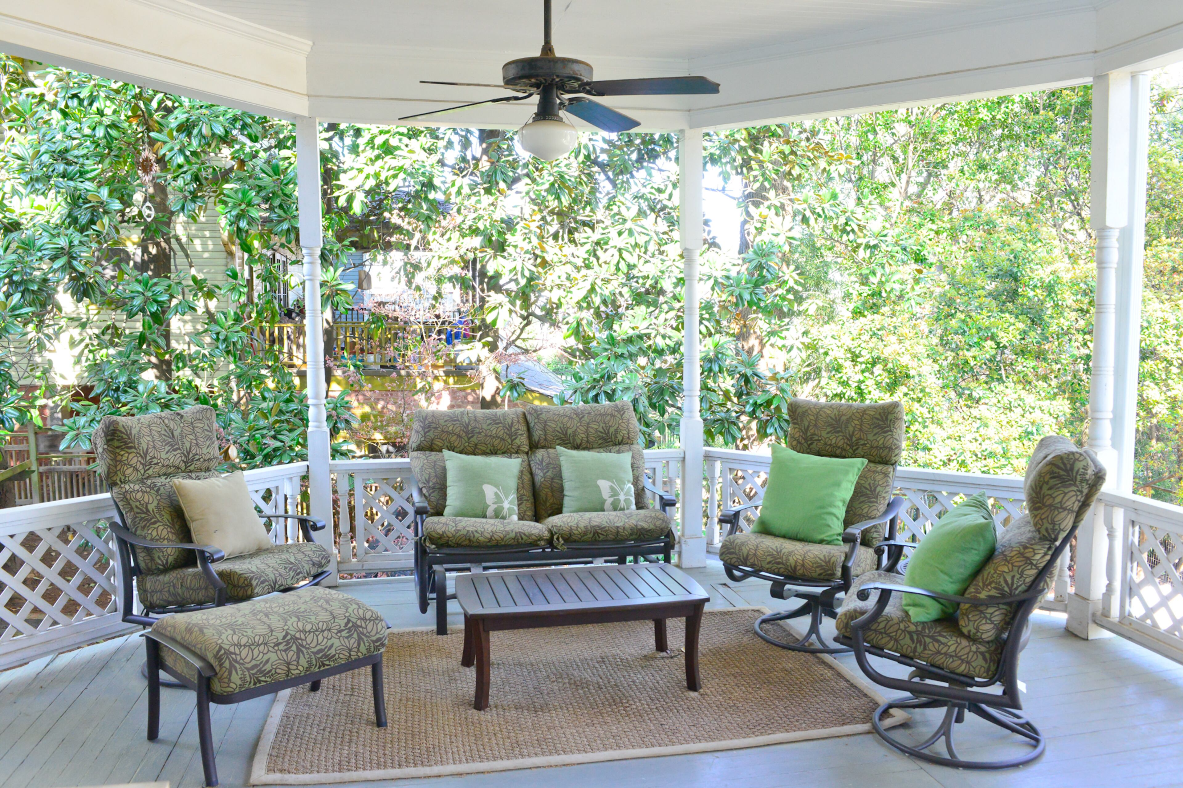 A porch wraps around three sides of the Inman Park home. The previous owners added onto the outdoor space in the early '70s after they bought and razed the house next door, said Bill Goodman and Karen Goeckel, who bought the home in 2014.