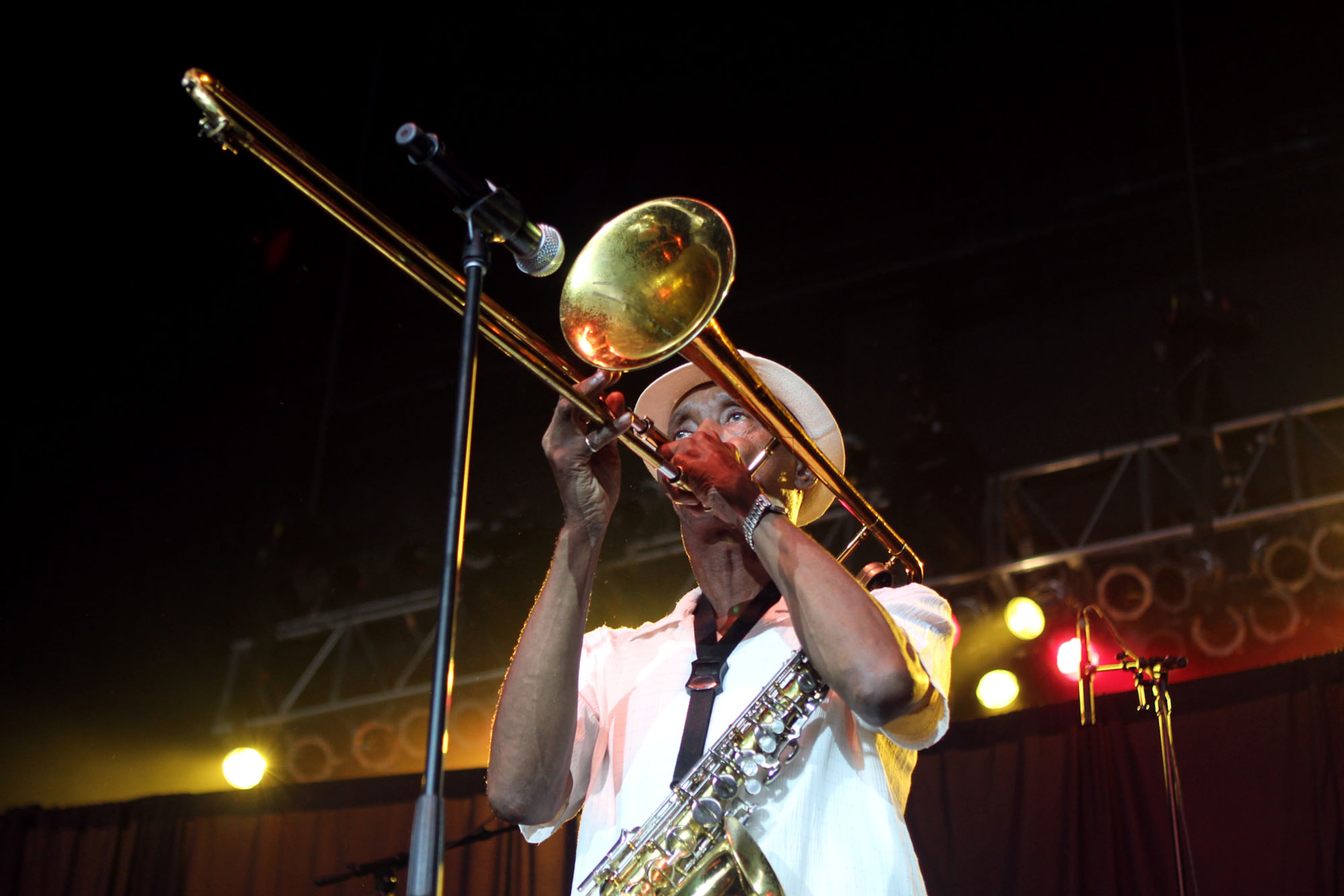 Jimmy Brown, lead singer, trombonist and flute player for the '70s band Brick, performs at the 2013 Flashback Festival at Aaron's Amphitheatre at Lakewood in Atlanta on Saturday.