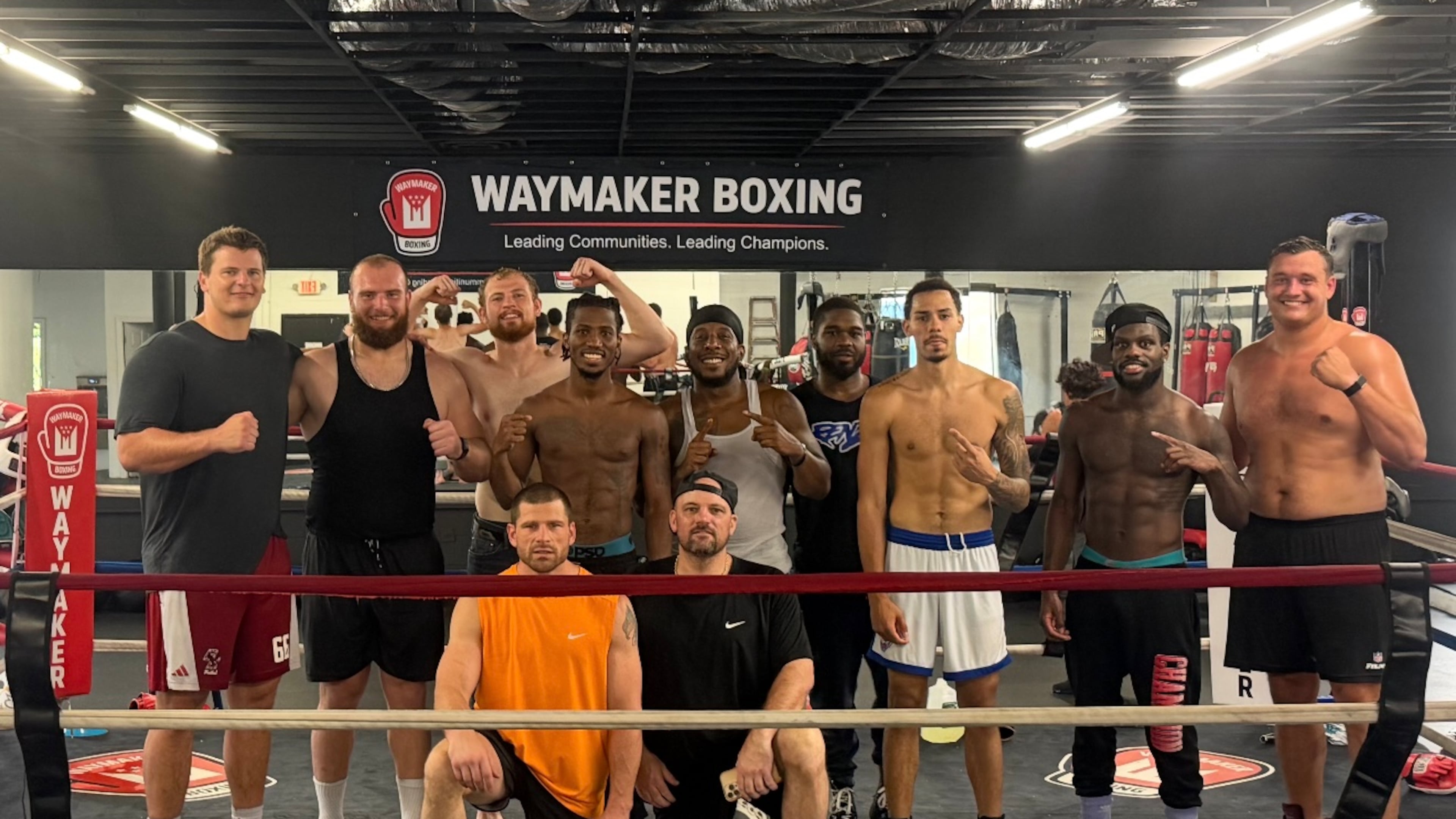 Falcons right guard Chris Lindstrom (far right) poses with other boxes on July 15, 2026, at Waymaker Boxing in Dorchester, Massachusetts.