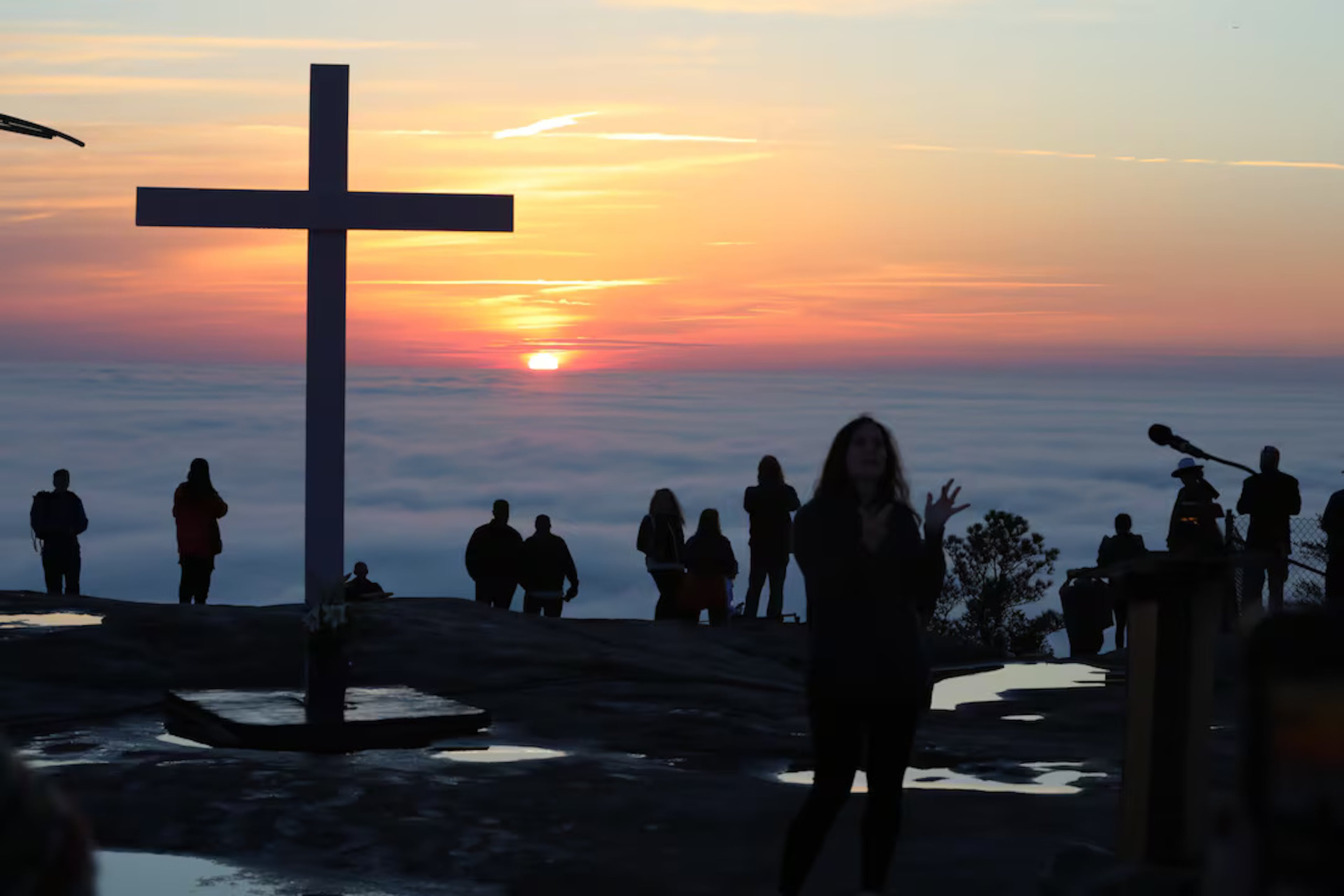 Stone Mountain Park’s annual Easter Sunrise Service features services atop and at the base of the mountain on Sunday, April 5. (Miguel Martinez/AJC)