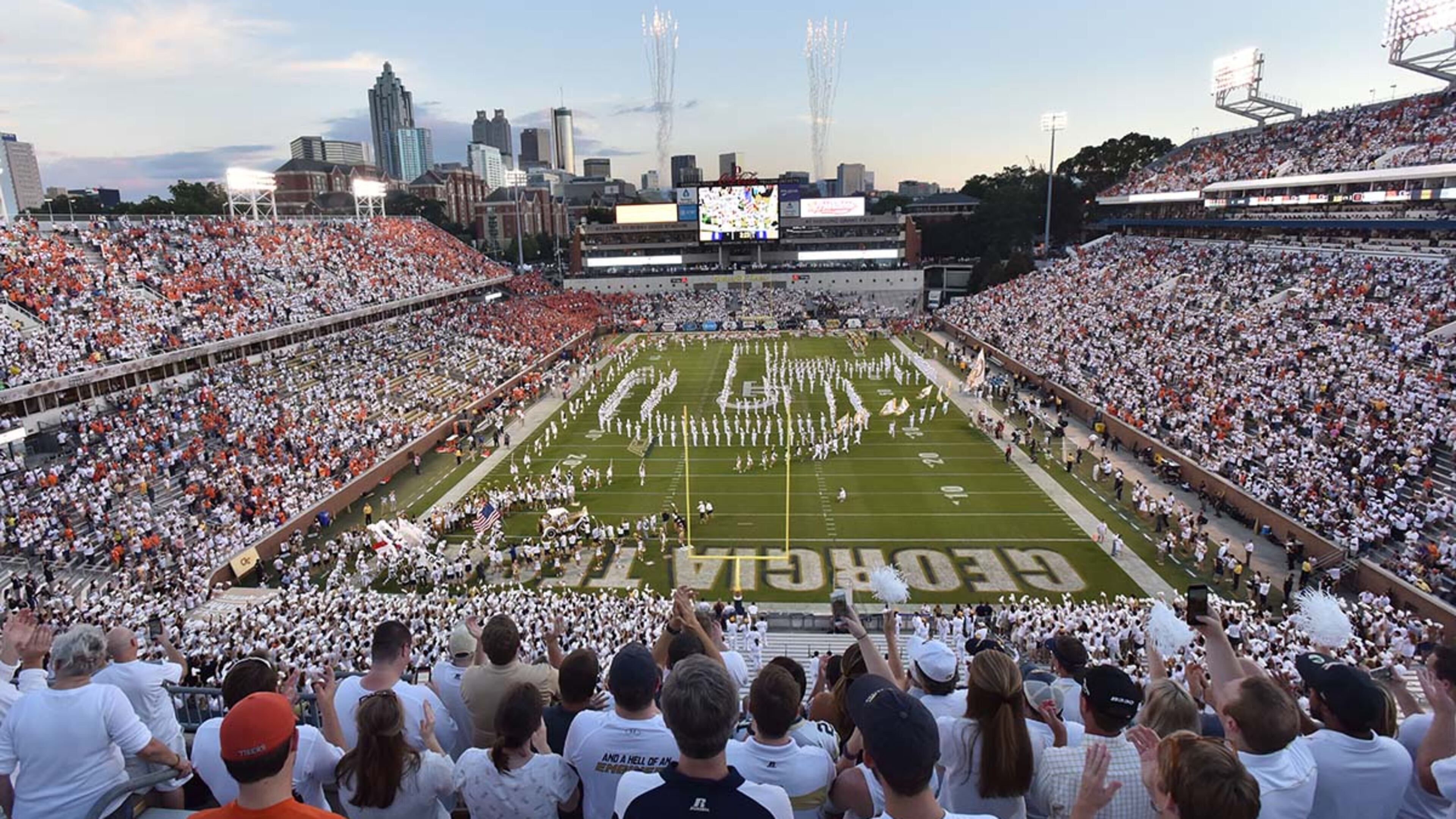 Georgia Tech’s Ramblin’ Wreck leads the band, cheerleaders, Buzz, players, and coaches before the start of the Georgia Tech home game against the Clemson Tigers at Bobby Dodd Stadium on Thursday, September 22, 2016. HYOSUB SHIN / HSHIN@AJC.COM