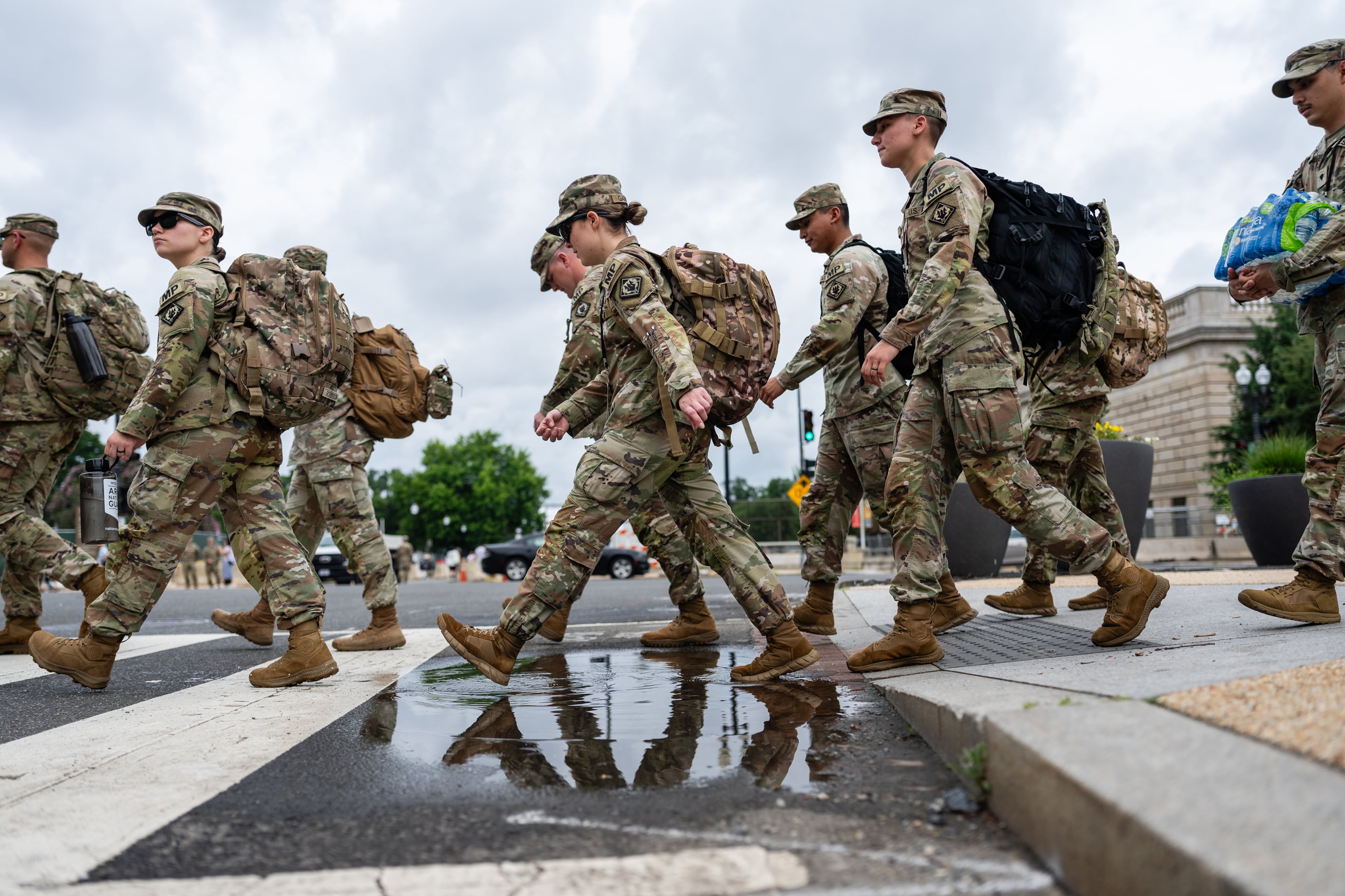 Troops carried supplies ahead of the U.S. Army's 250th Anniversary Parade along the National Mall in Washington in June.