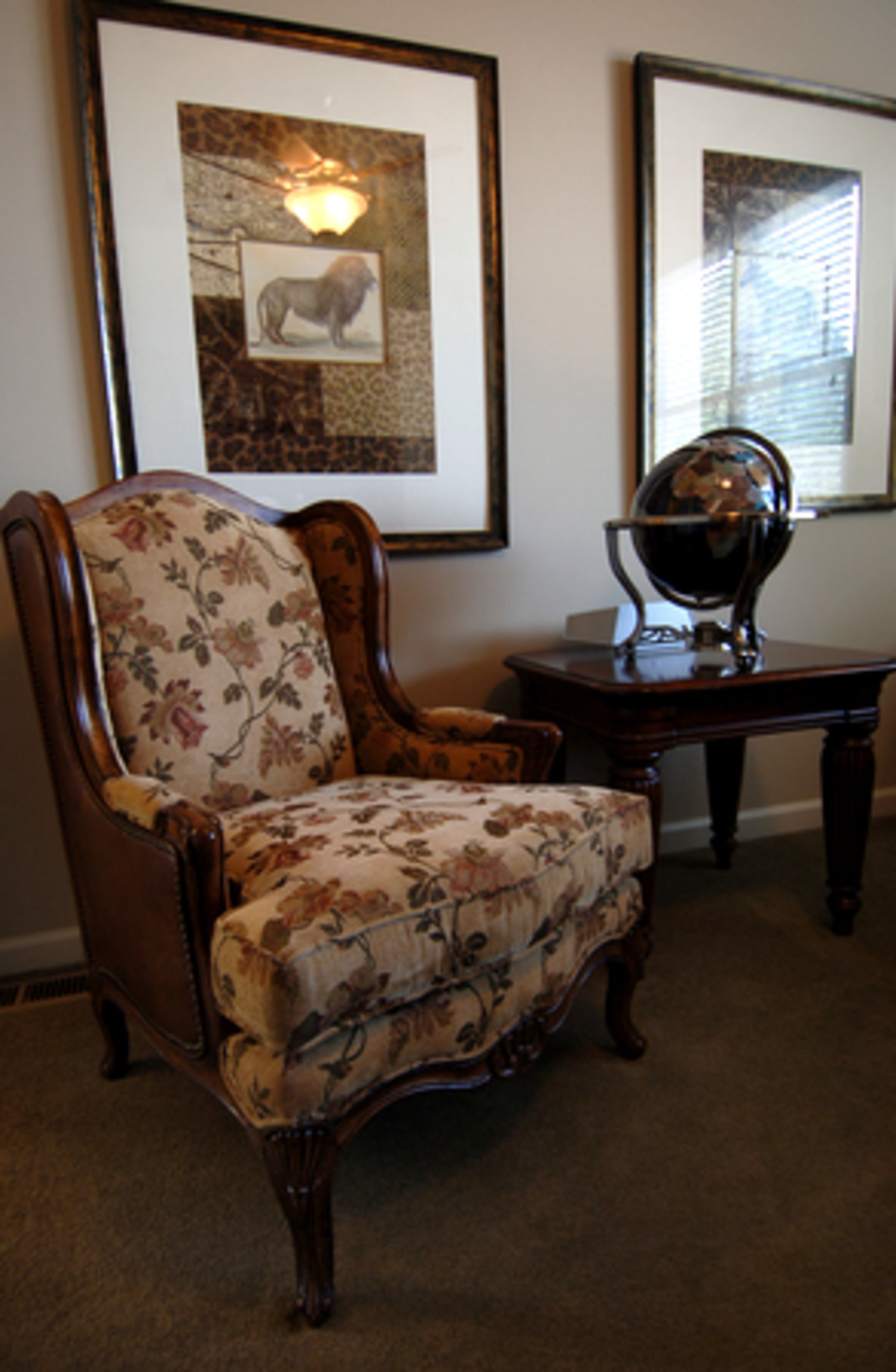 A chair and globe in Heather's home office. She works in medical sales and also is a real estate agent on the side.