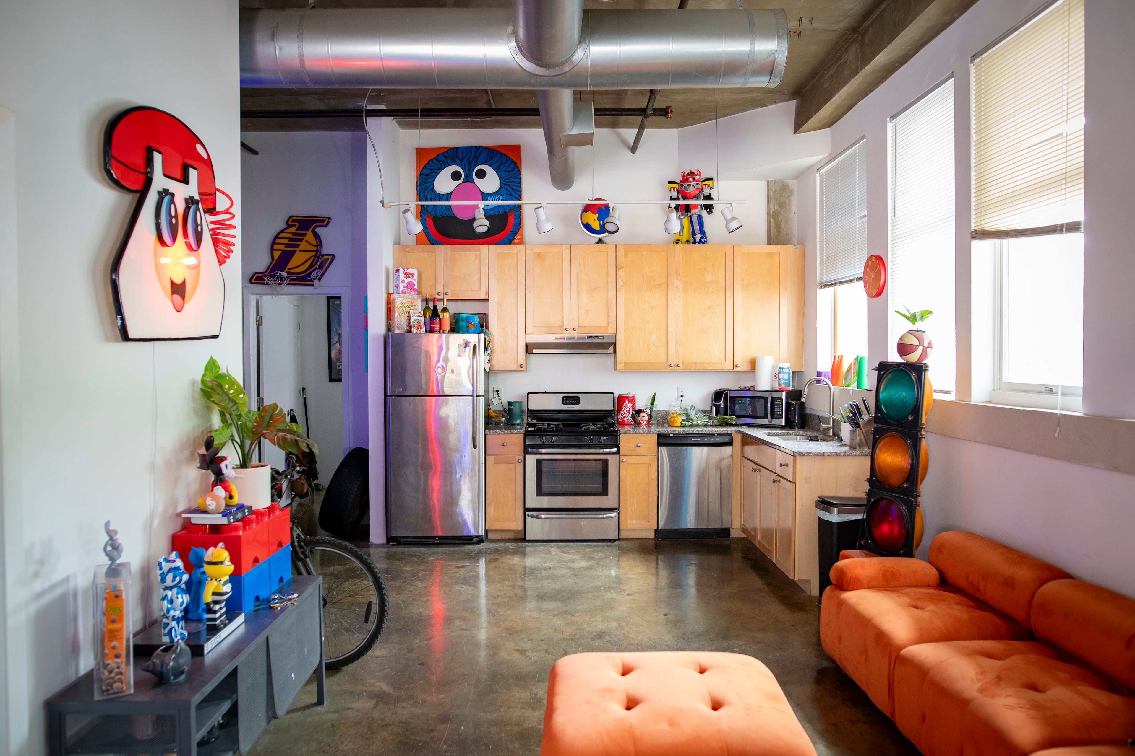 Pop culture and cartoon references abound in Lyss' sunlit residence.