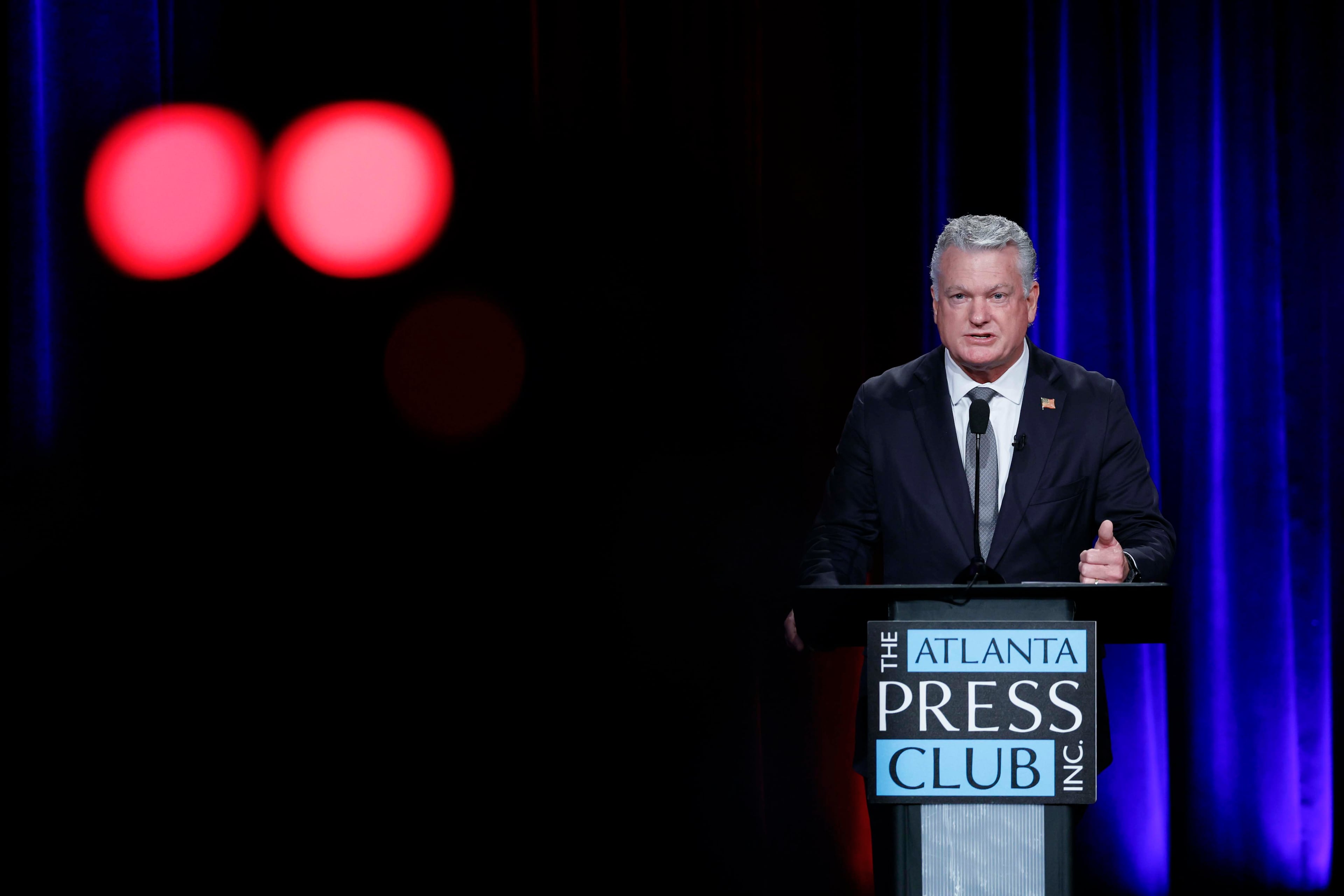 Republican U.S. Rep. Mike Collins delivers his opening remarks at the Georgia Public Broadcasting studio in Atlanta on Tuesday, Oct. 13, 2026. (Miguel Martinez/AJC)