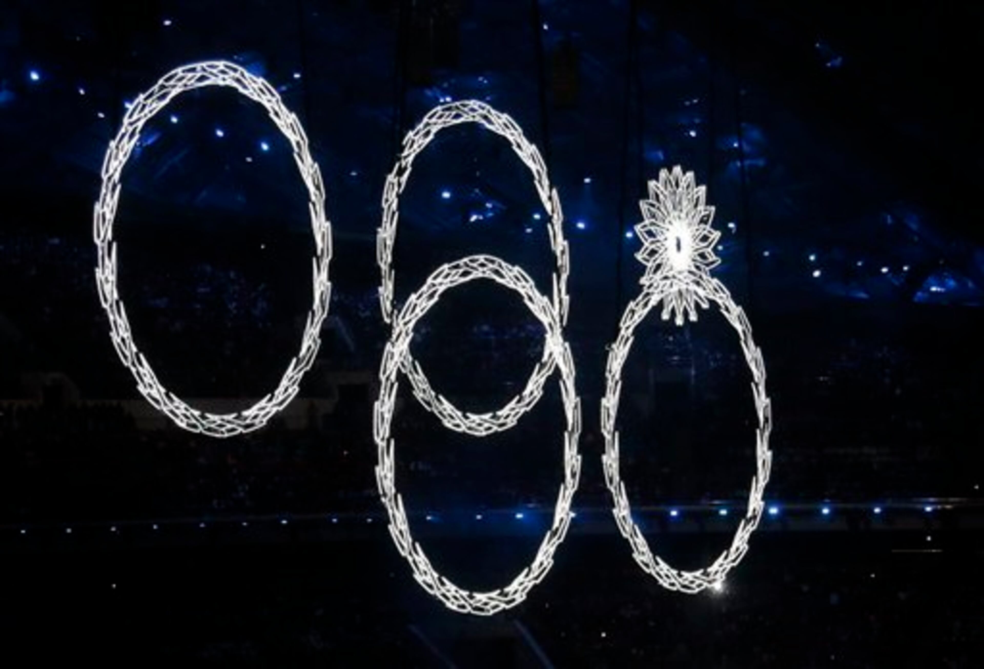 One of the Olympic rings fails to open during a portion of the show where snowflakes were supposed to transition to rings during the opening ceremony of the 2014 Winter Olympics in Sochi, Russia, Friday, Feb. 7, 2014. (AP Photo/Ivan Sekretarev)
