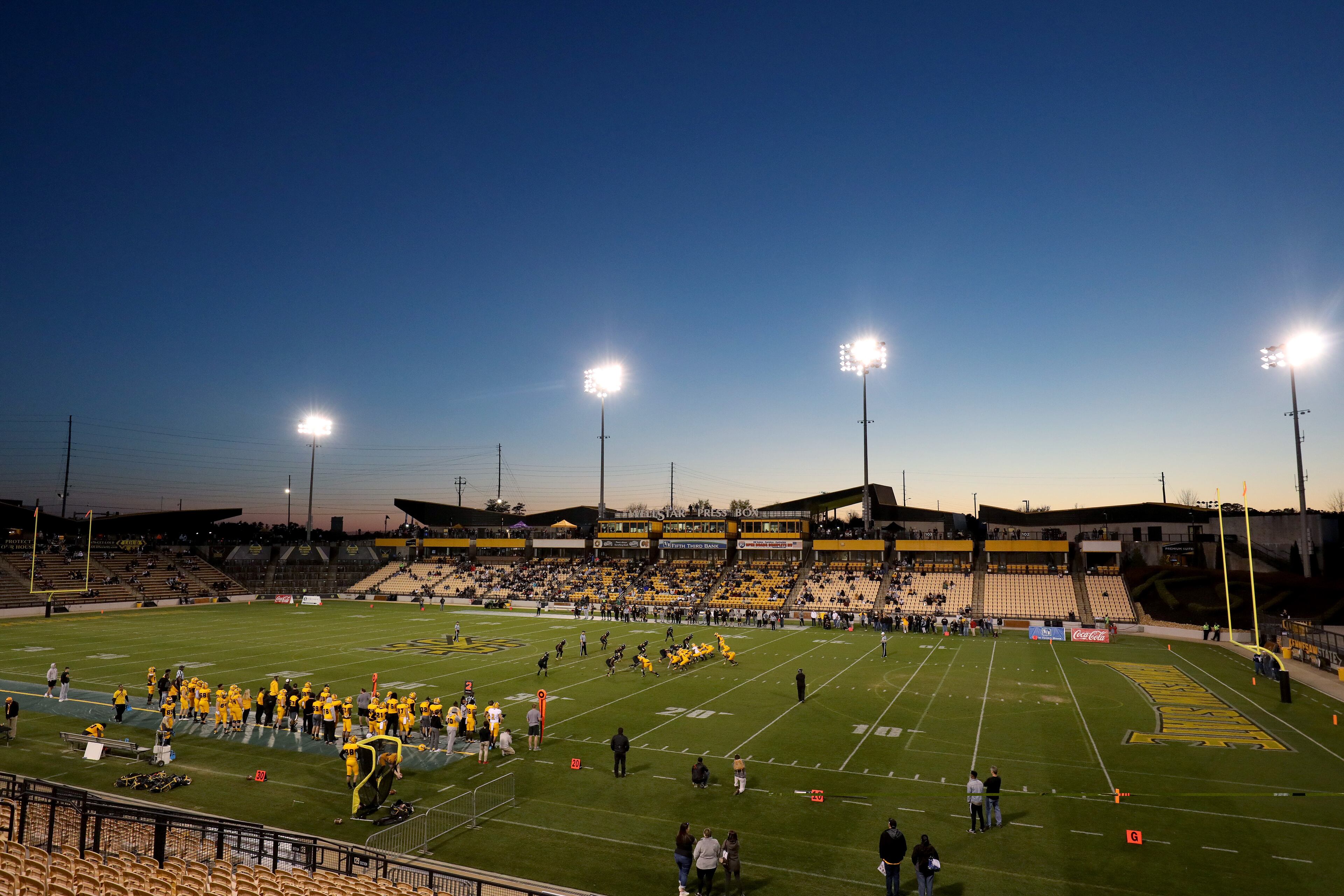 March 22, 2019 - Kennesaw, Ga: The sun sets during the Kennesaw State University spring football game at Fifth Third Bank Stadium Friday, March 22, 2019 in Kennesaw, Ga.. (JASON GETZ/SPECIAL TO THE AJC)