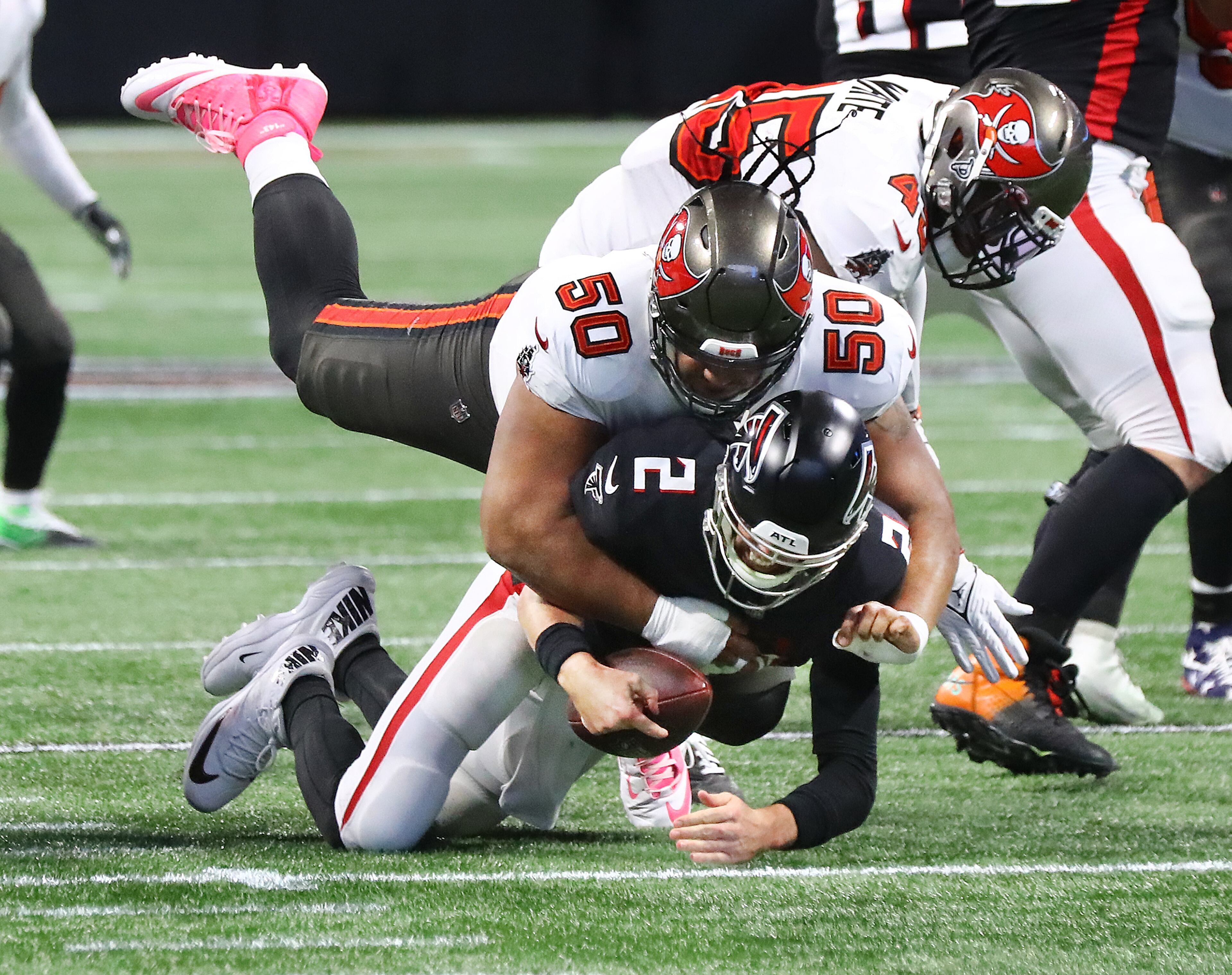 Buccaneers Vita Vea sacks Falcons quarterback Matt Ryan during the second quarter for a loss in a NFL football game on Sunday, Dec 5, 2021, in Atlanta. (Curtis Compton / Curtis.Compton@ajc.com)