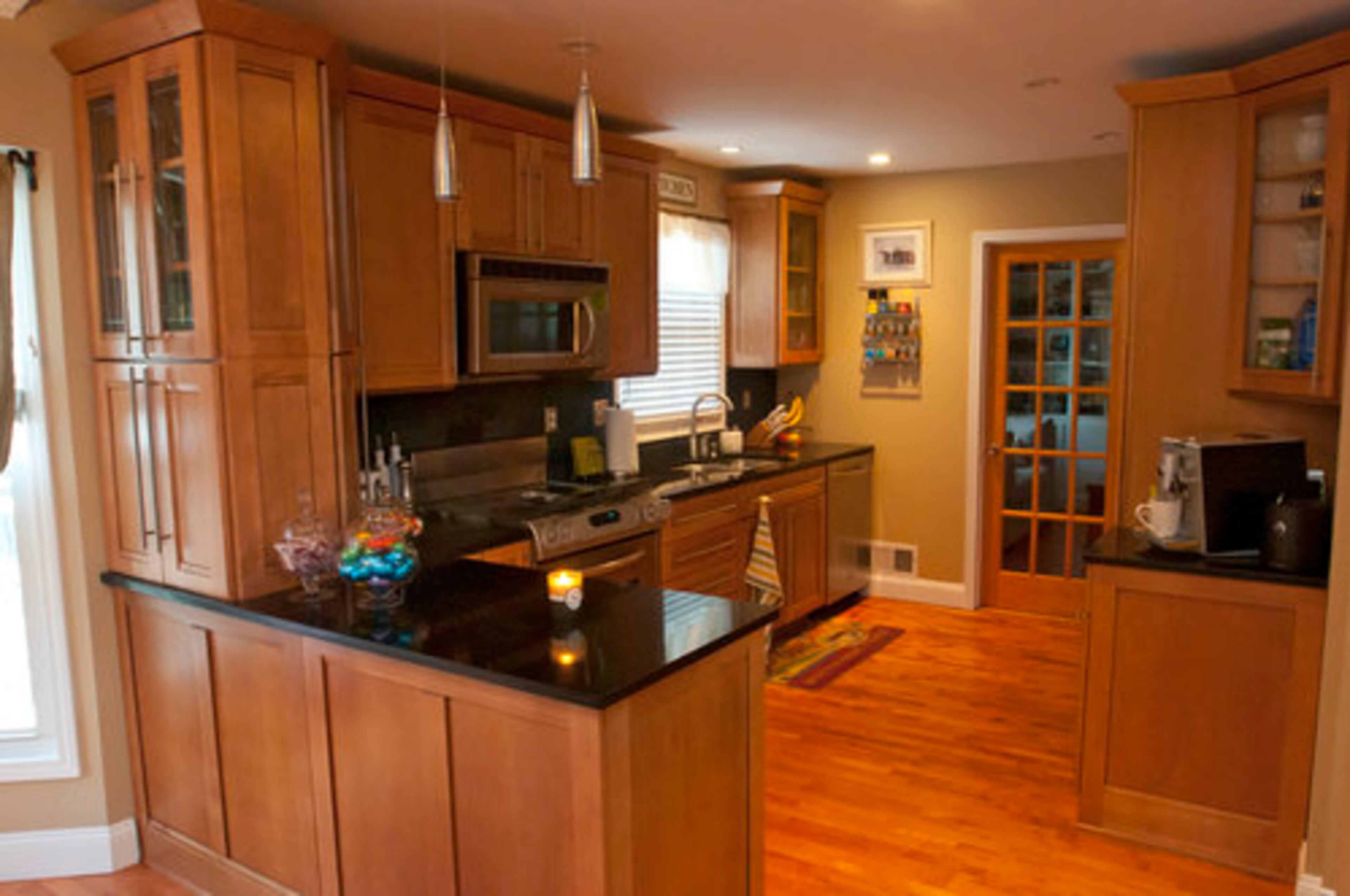 The kitchen leads directly into the breakfest room and reading room which has a paned glass door