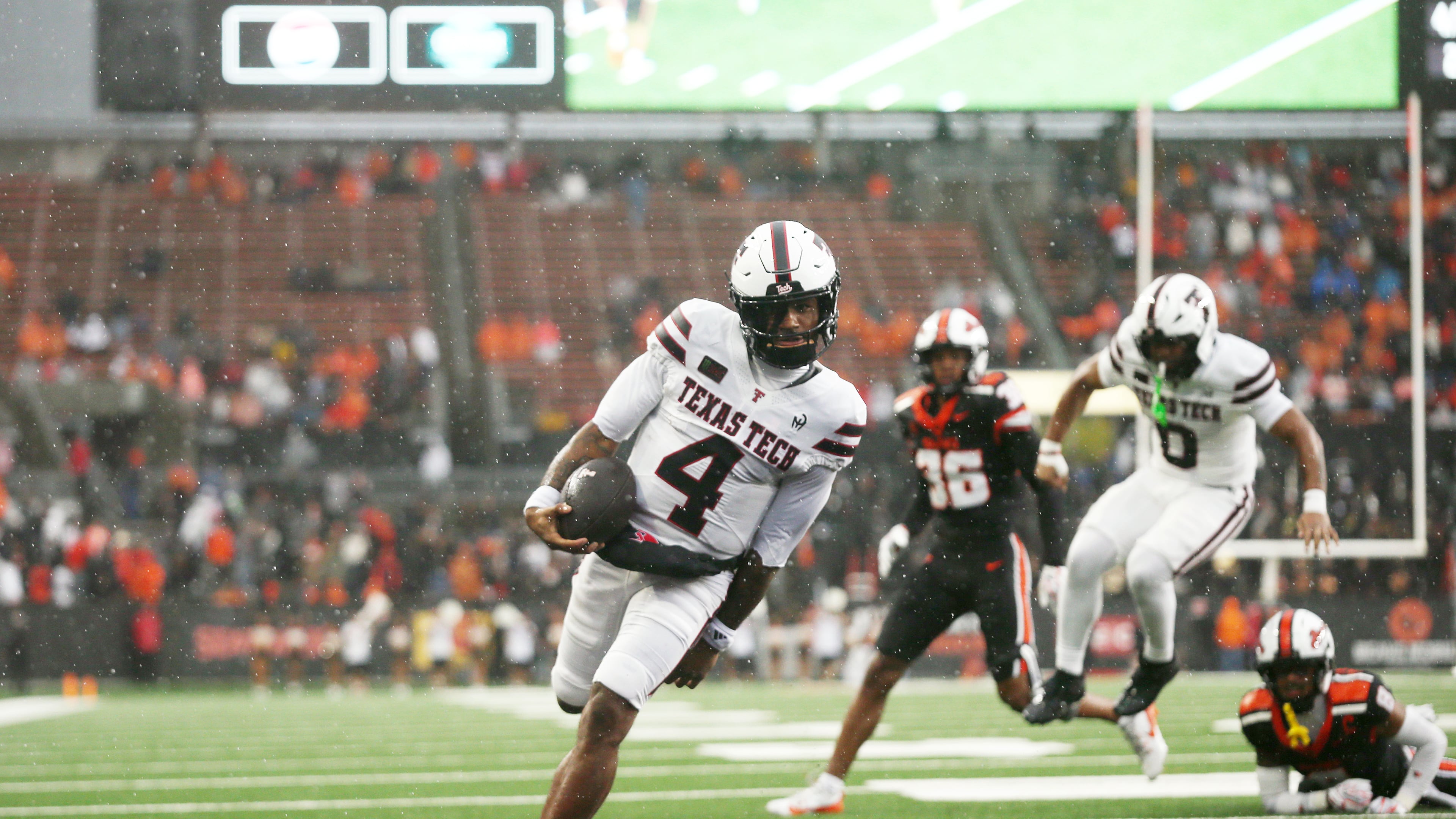 Texas Tech quarterback Tommy Castellanos (4) runs into the end zone for a touchdown during the first half of an NCAA college football game against Oregon State, Saturday, Sept. 12, 2026, in Corvallis, Ore. (AP Photo/Lydia Ely)