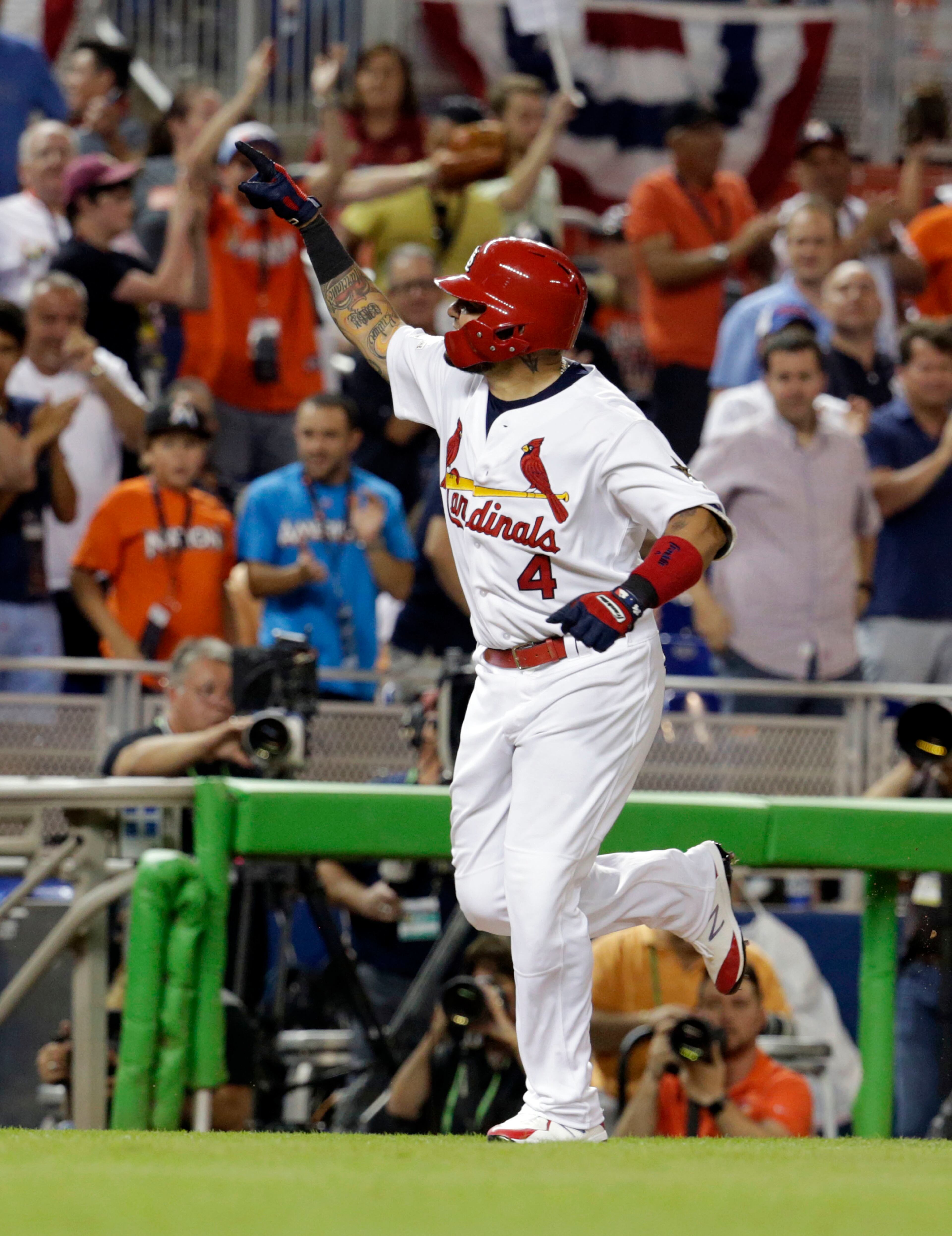 National League's St. Louis Cardinals catcher Yadier Molina (4), rounds the bases after hitting a homerun in the sixth inning, during the MLB baseball All-Star Game, Tuesday, July 11, 2017, in Miami. (AP Photo/Lynne Sladky)