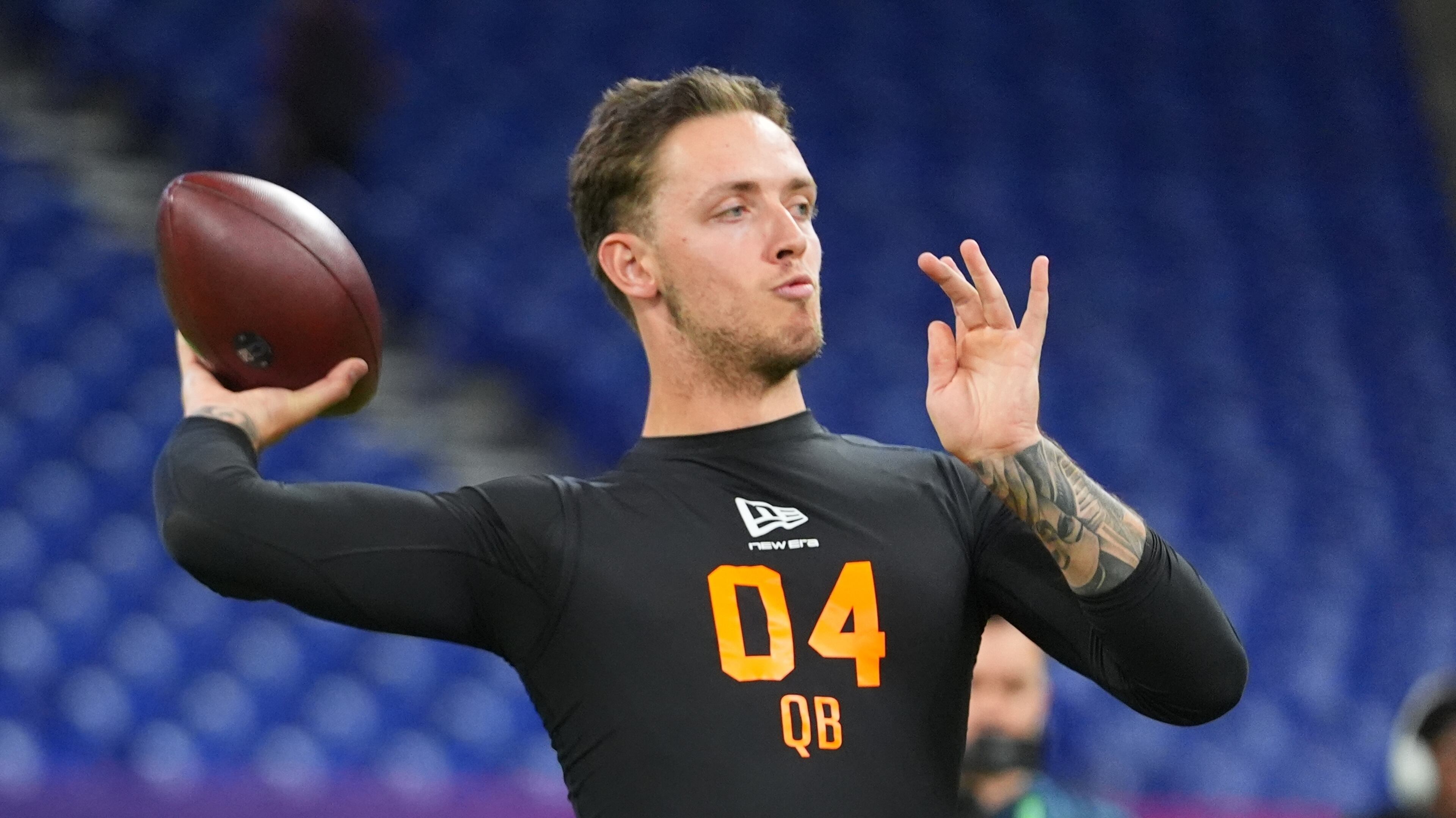 FILE - Miami quarterback Carson Beck (04) runs a drill at the NFL football scouting combine in Indianapolis, Feb. 28, 2026. (AP Photo/Julio Cortez, File)