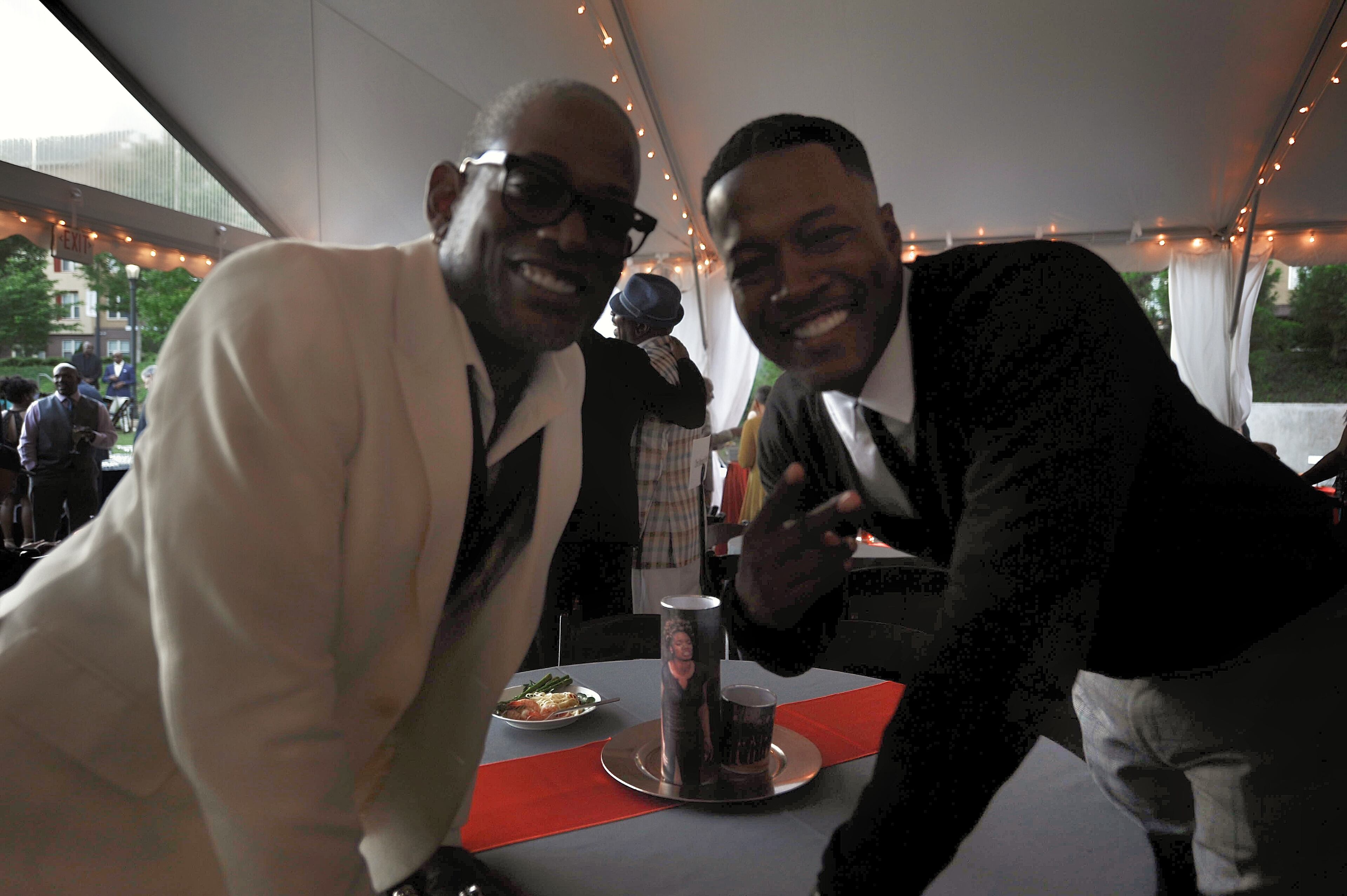 At the Millenium Gate Museum at Atlantic Station following the daytime golf tournament that accompanies the event every year, actors Terrence 'T.C.' Carson and Flex Alexander pose for the camera.