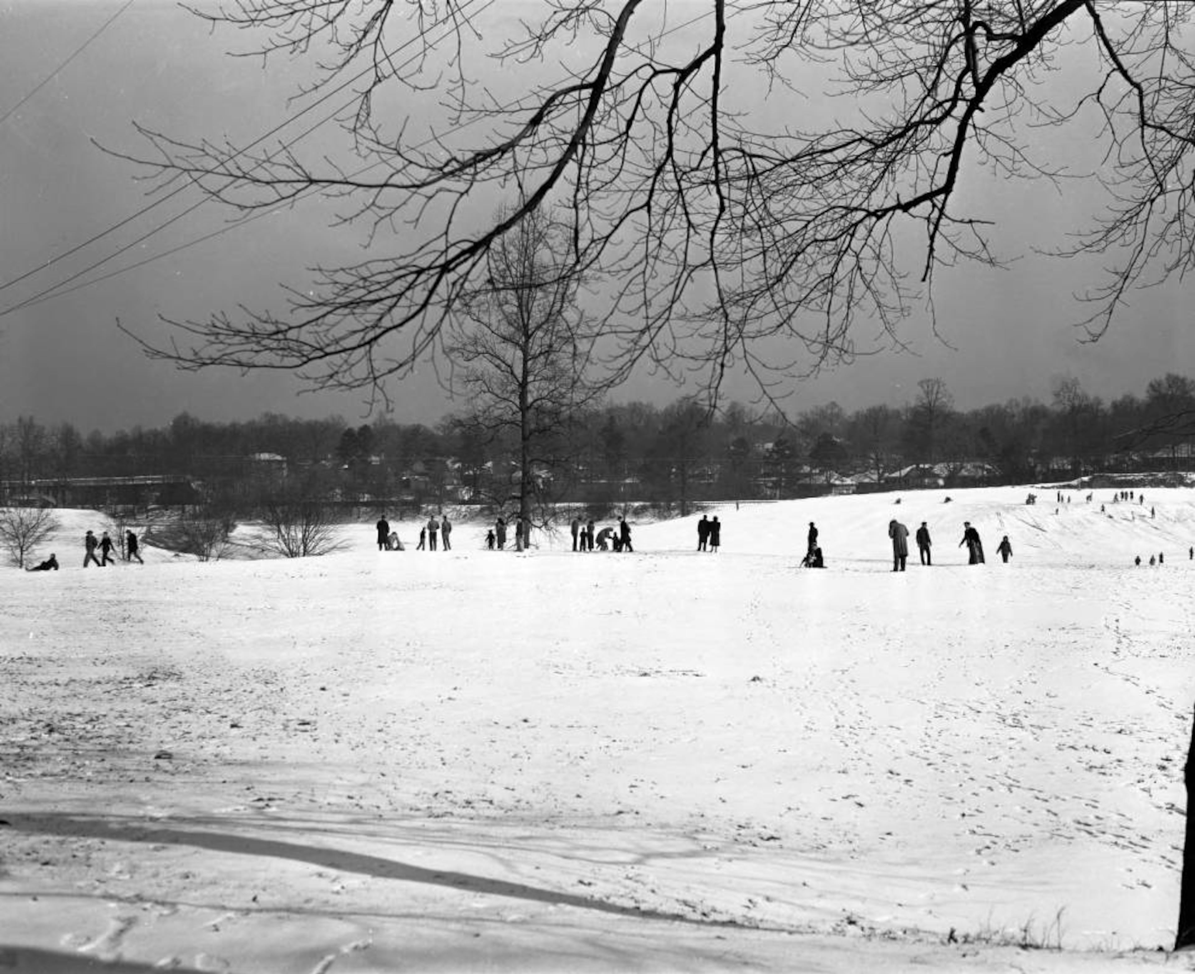 Vistors to Piedmont Park enjoying a recent snowfall in January 1948.