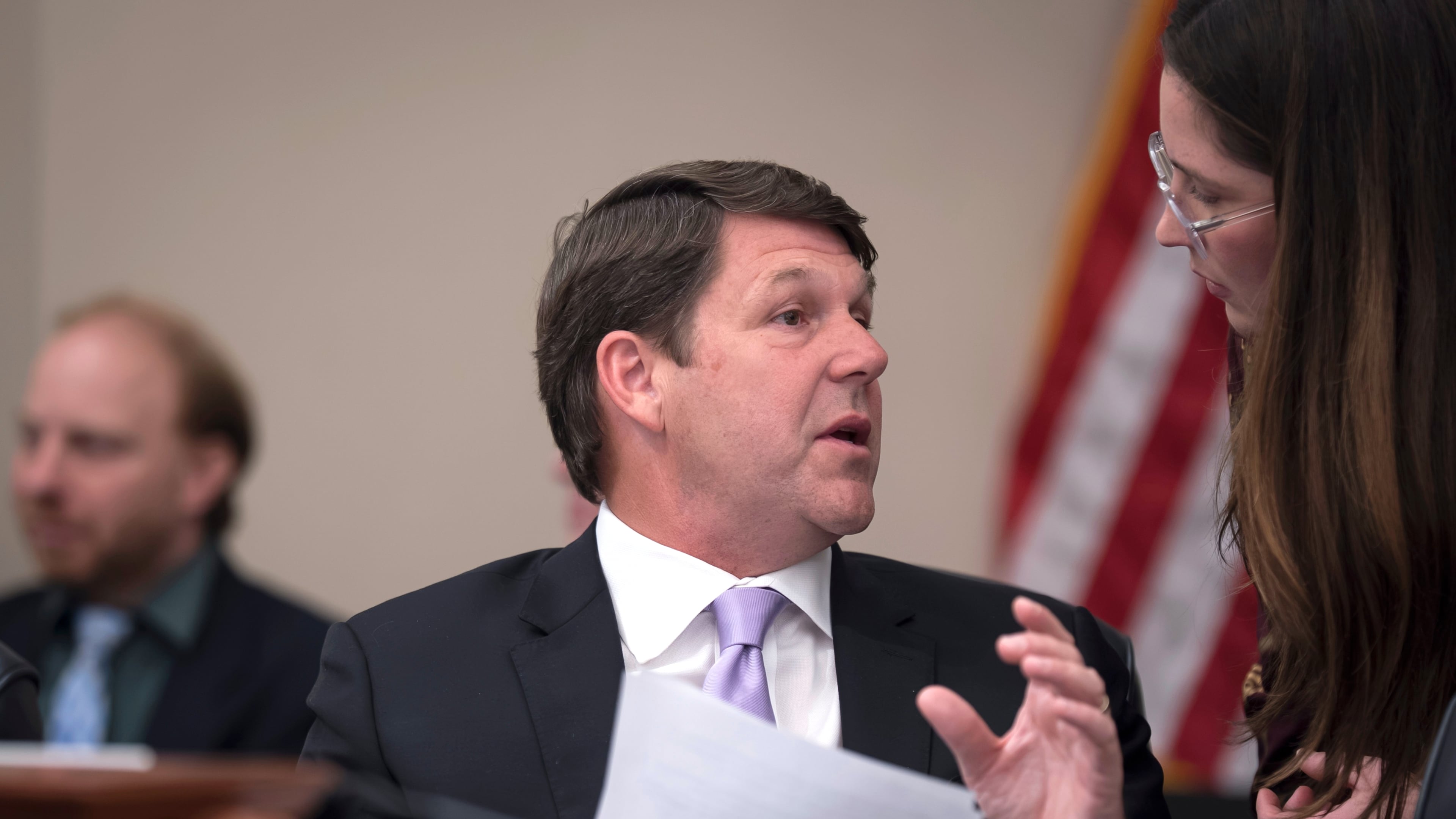 House Budget Committee Chairman Jodey Arrington, R-Texas, center, speaks with an aide during a markup on the Fiscal Year 2027 spending plan, at the Capitol in Washington, Thursday, July 16, 2026. (AP Photo/J. Scott Applewhite)