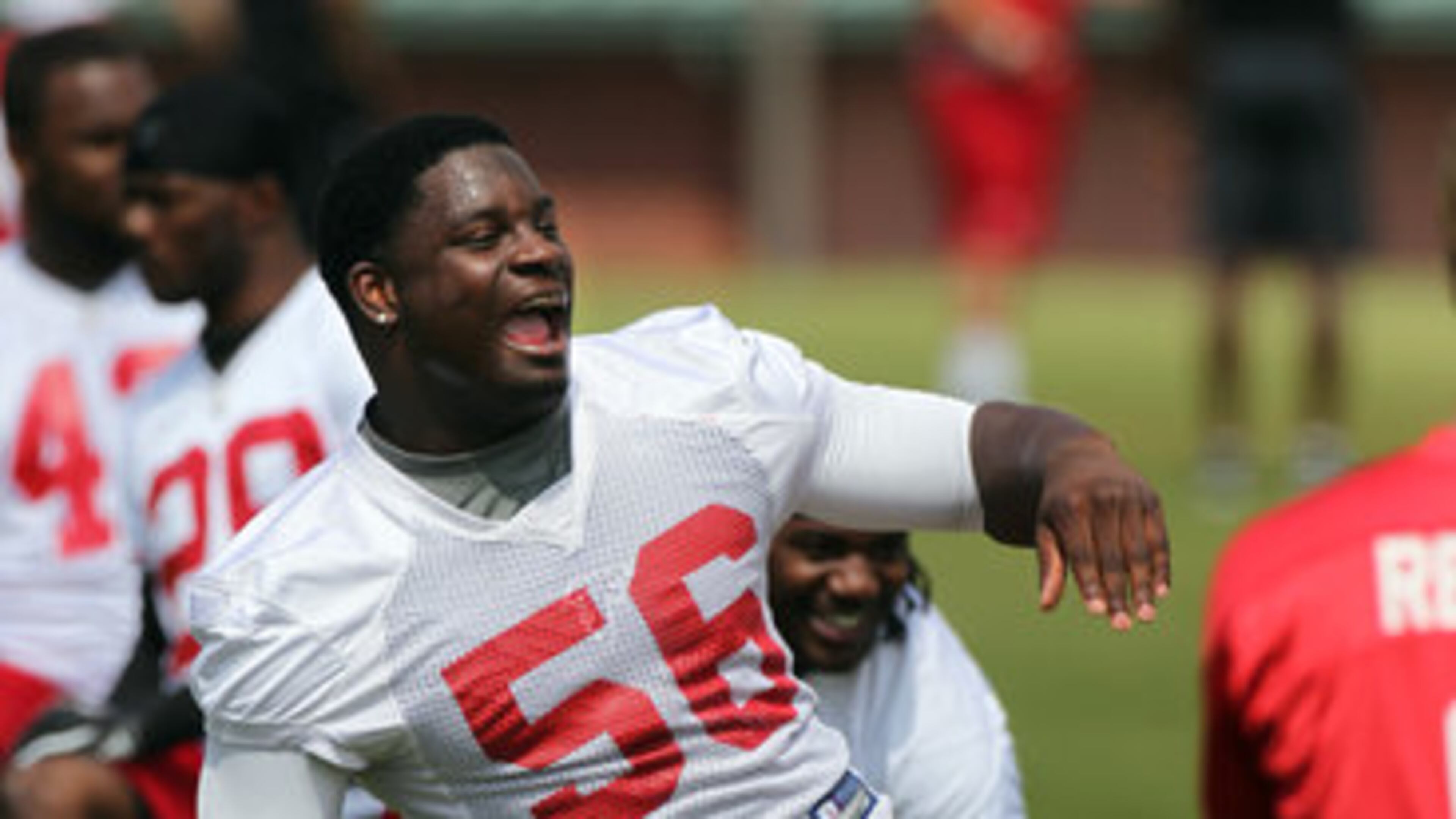 060612 FLOWERY BRANCH : Falcons linebacker Sean Weatherspoon fires up teammates during warmups for team practice at Flowery Branch on Wednesday, June 6, 2012. CURTIS COMPTON / CCOMPTON@AJC.COM Falcons linebacker Sean Weatherspoon . CURTIS COMPTON / CCOMPTON@AJC.COM