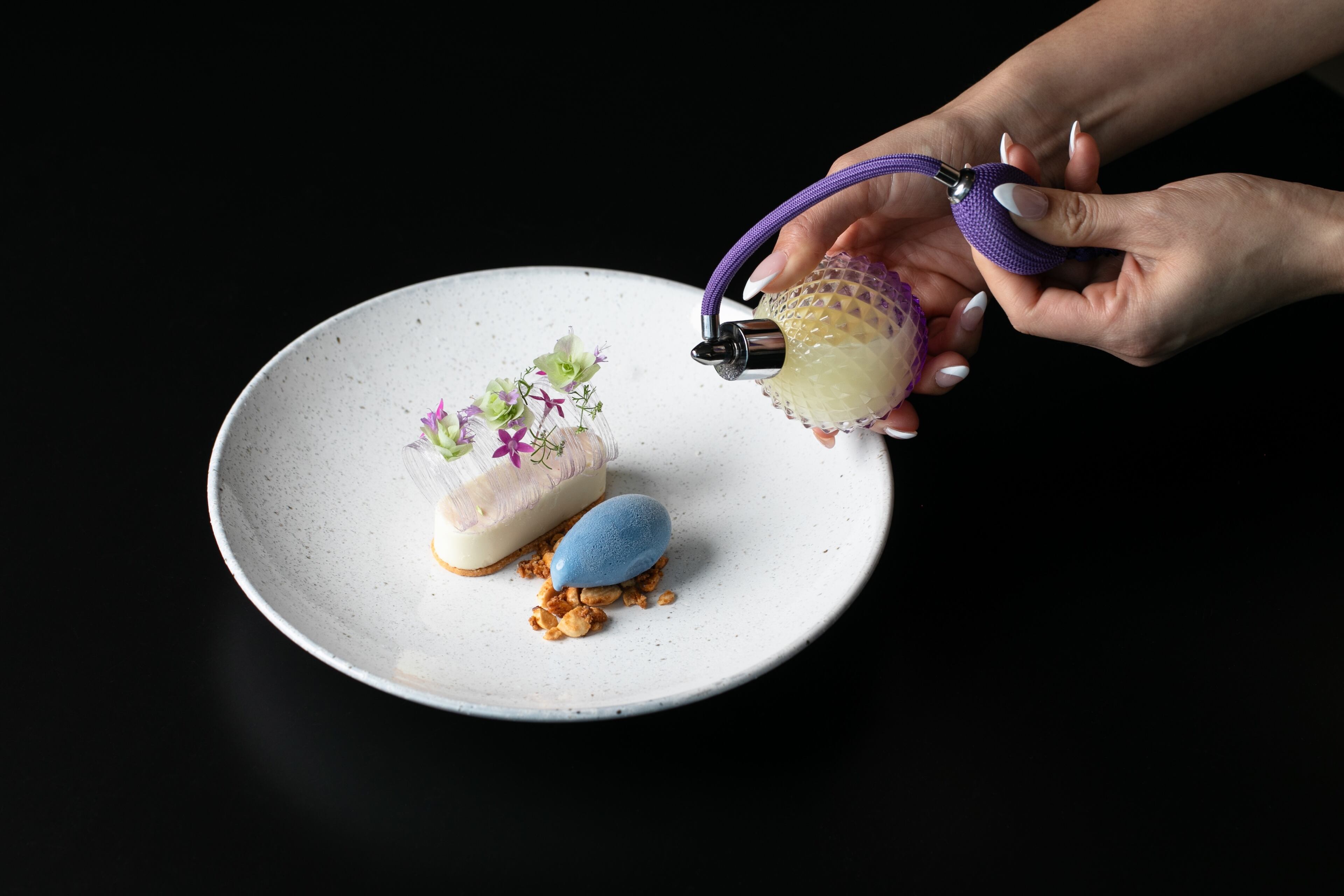 Executive pastry chef Daniella Lea Rada’s team crafts desserts for the various eating establishments at the Signia by Hilton. Pictured is the farfalla with butterfly pea powder gelato on the menu at the hotel's fine-dining restaurant Capolinea. (Courtesy of Signia by Hilton/ Erik Meadows Photography)