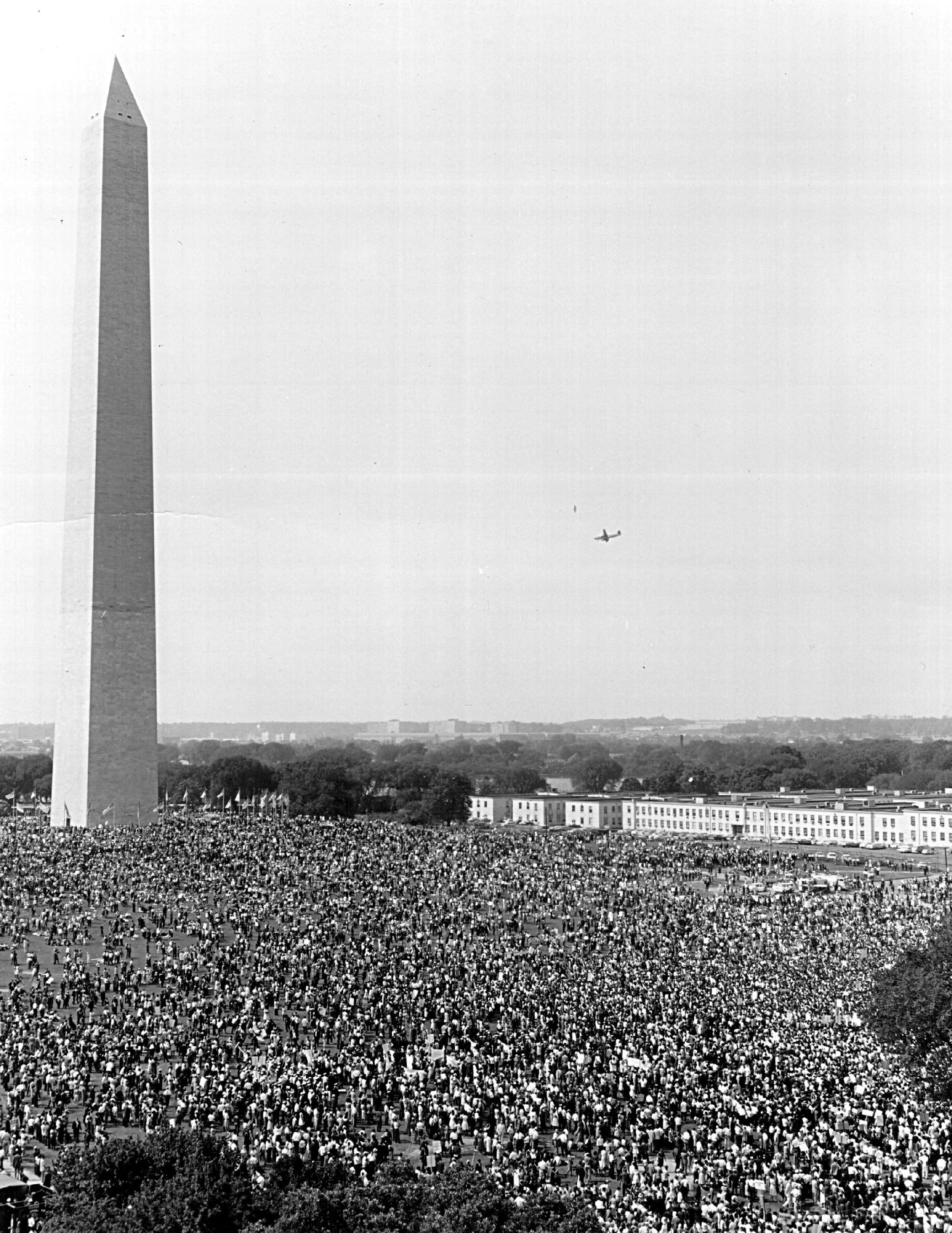 Thousands of Americans are shown gathered beneath the Washington Monument on August 28, 1963 for the march in behalf of racial equality. (Photo by National Archive/Newsmakers)