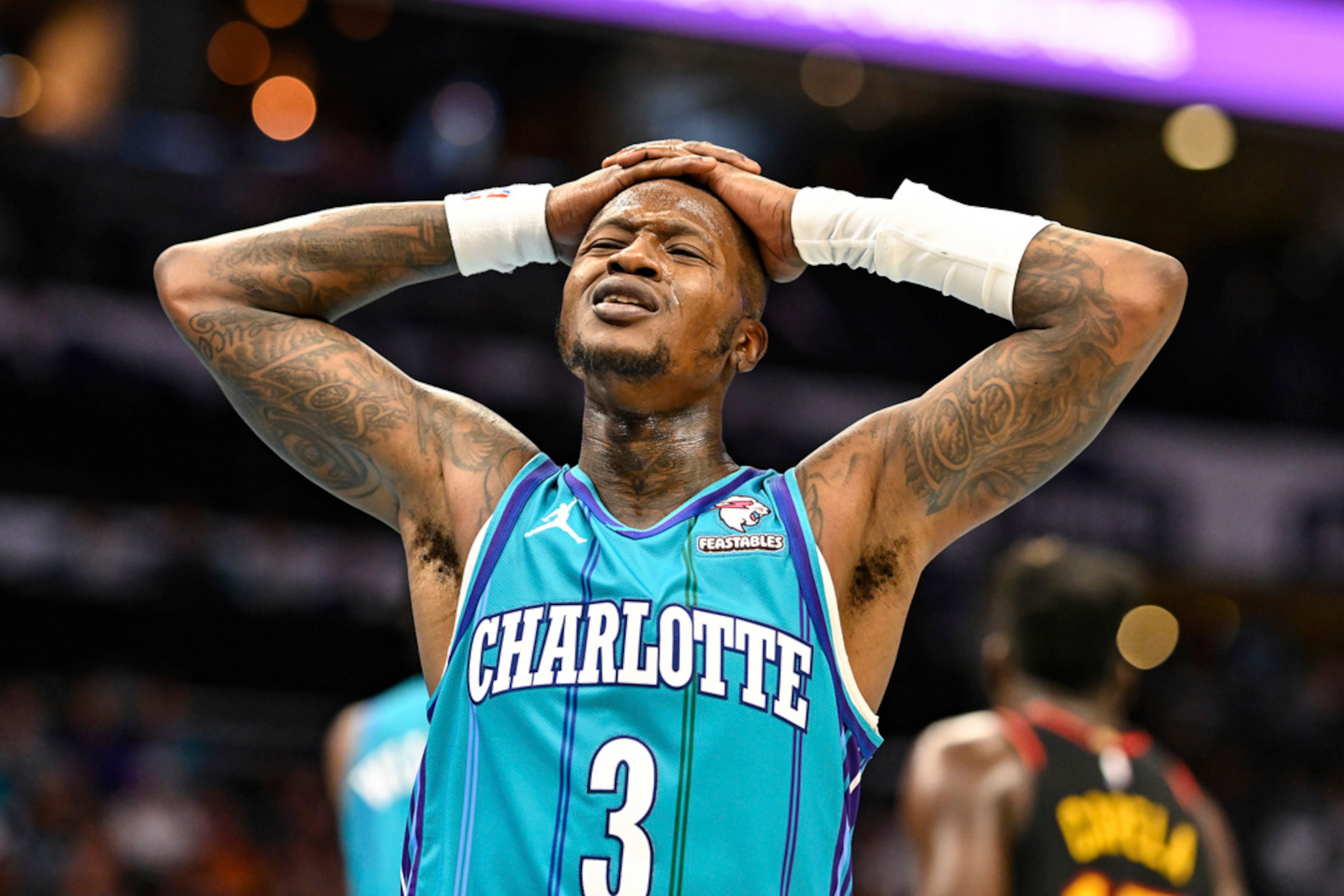 Charlotte Hornets guard Terry Rozier (3) reacts to a foul call during the second half of the team's NBA basketball game against the Atlanta Hawks, Wednesday, Oct. 25, 2023, in Charlotte, N.C. (AP Photo/Matt Kelley)
