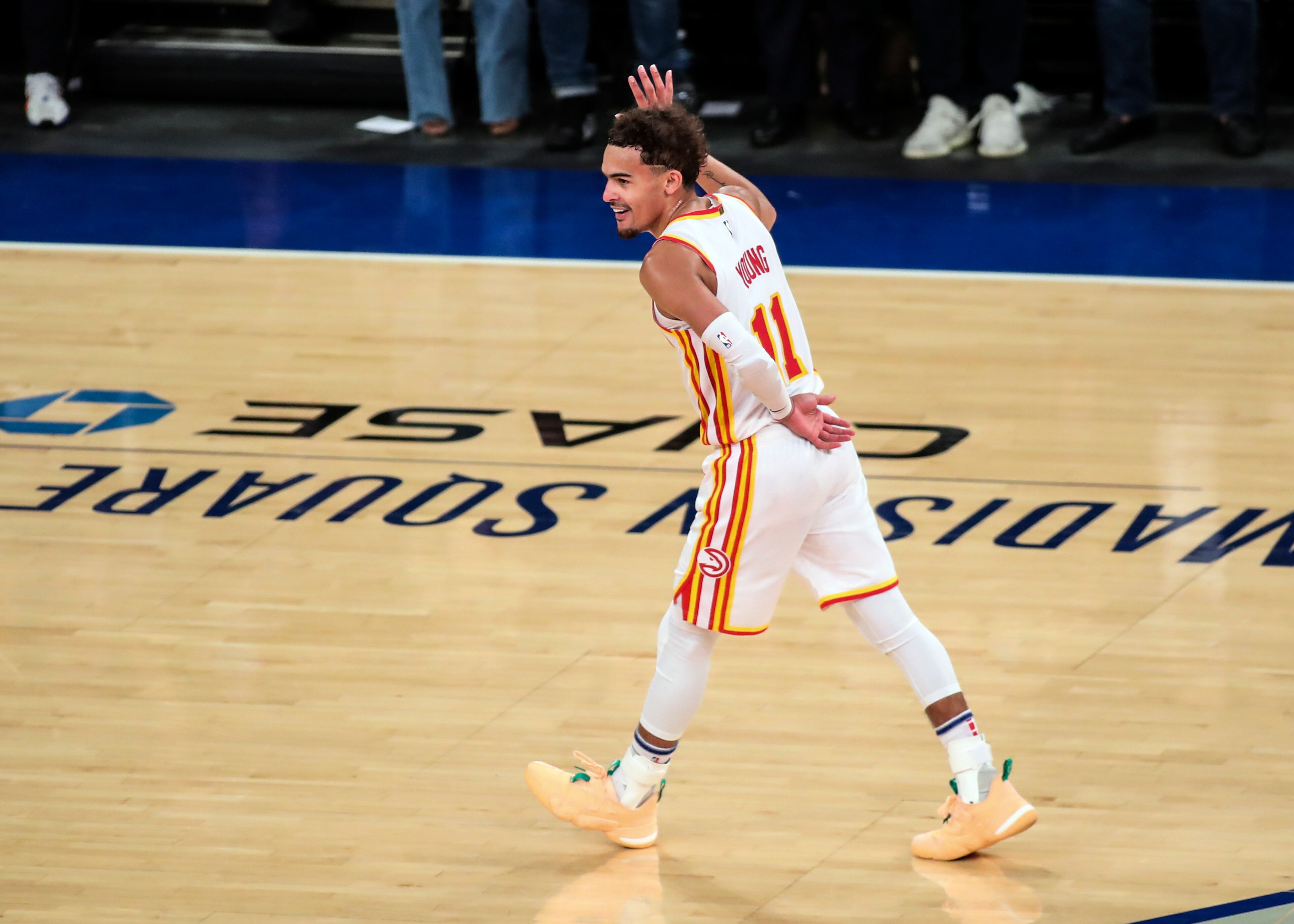 Atlanta Hawks guard Trae Young (11) waves to the crowd after making a three point shot against the New York Knicks in the fourth quarter of Game 5 of an NBA basketball first-round playoff series Wednesday, June 2, 2021, in New York. (Wendell Cruz/Pool Photo via AP)