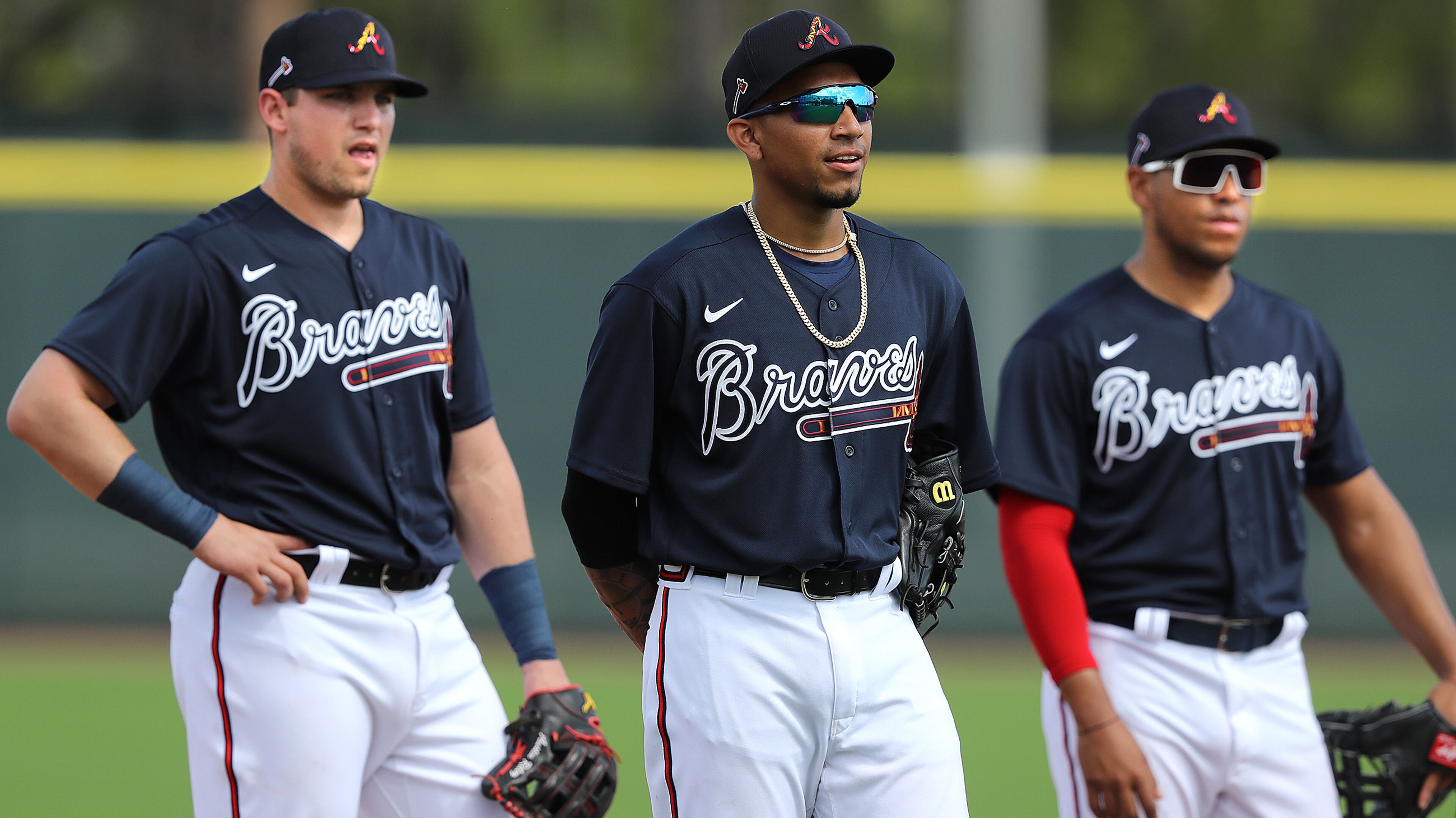 Braves Austin Riley (from left), Johan Camargo, and Yangervis Solarte line up to work at third base during the first full squad workout Tuesday, Feb. 18, 2020, at CoolToday Park in North Port, Fla.