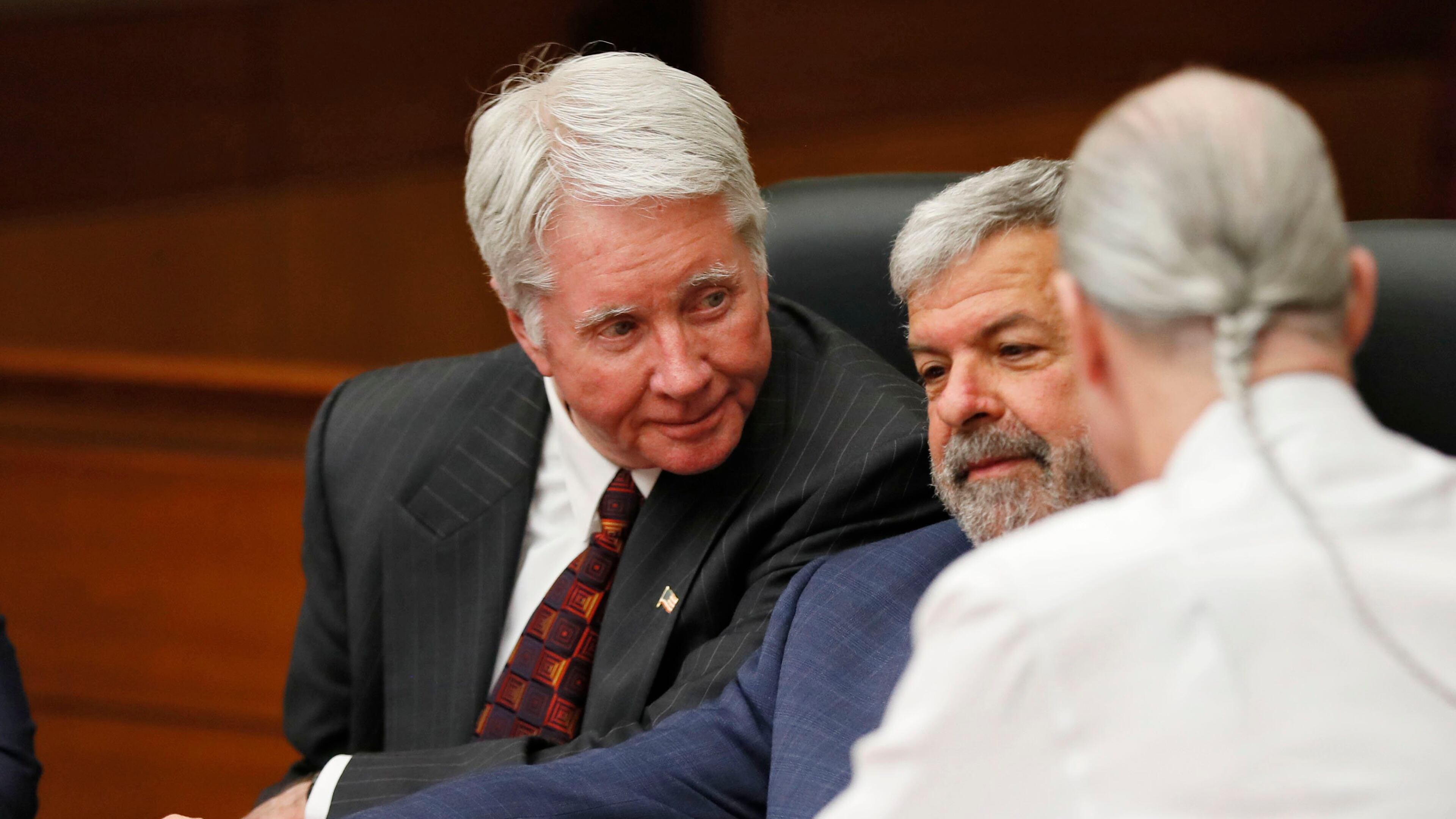 4/23/18 - Atlanta - Tex McIver (left), defense attorneys Don Samuel and Bruce Harvey talk during court discussion on giving the jurors an Allen charge, encouraging a deadlocked jury to reach a verdict, after jurors in the Claud "Tex" McIver trial say they "don't see a path" to overcome their differences on the defendant's intent for all but one of the five counts, including malice murder. The jury resumed their fifth day of deliberations this morning during the Tex McIver murder trial at the Fulton County Courthouse. Bob Andres bandres@ajc.com