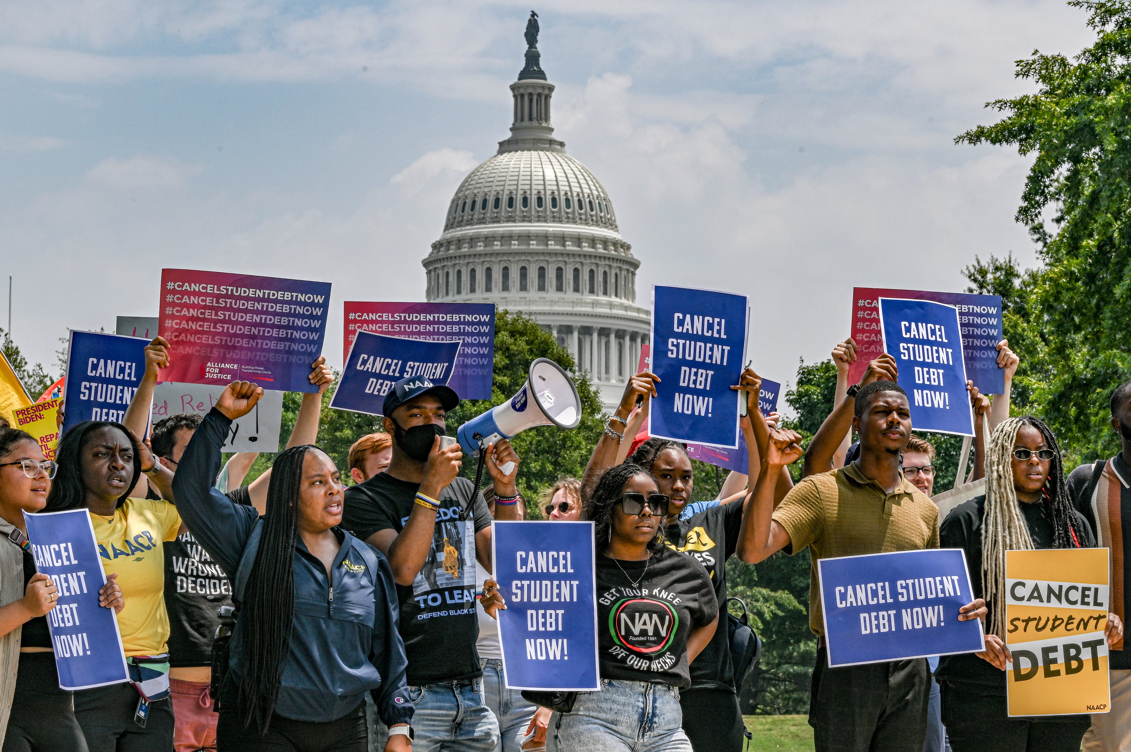 Demonstrators calling for the cancellation of student debt, in Washington, June 30, 2023. (Kenny Holston/The New York Times)