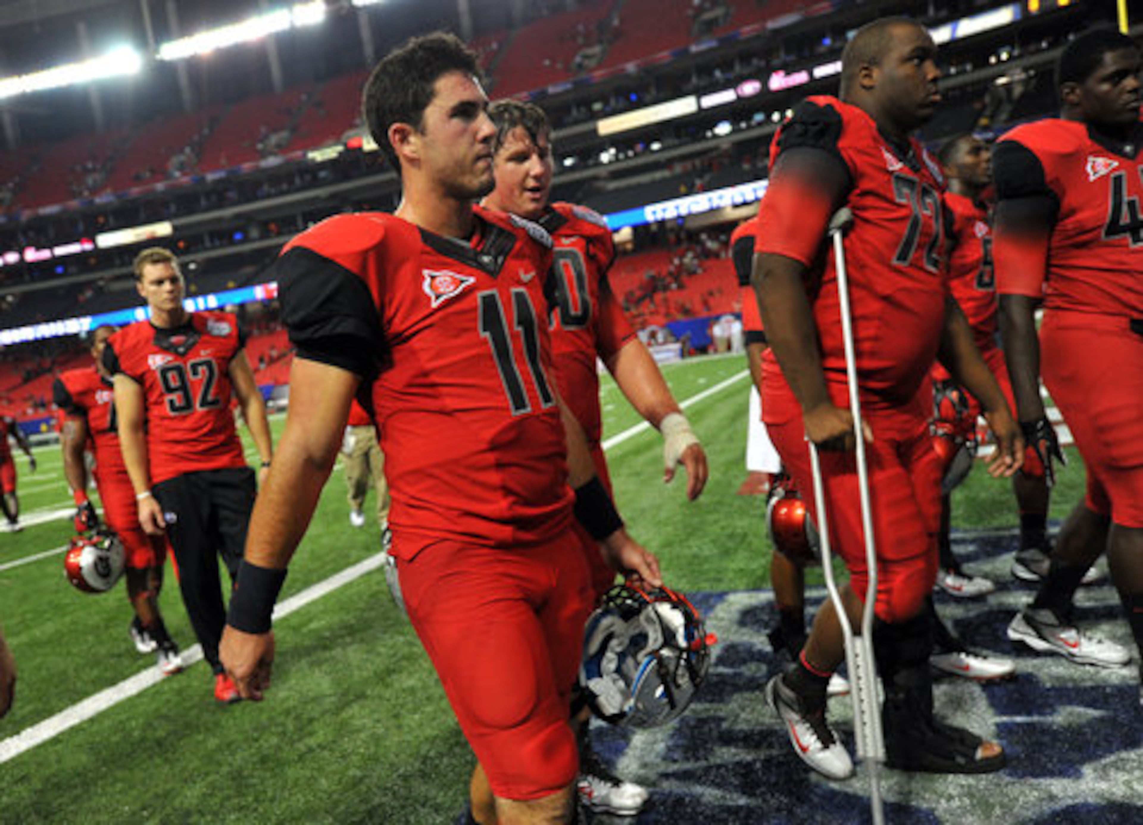 Georgia quarterback Aaron Murray walks off the field following a 35-21 loss to Boise State.