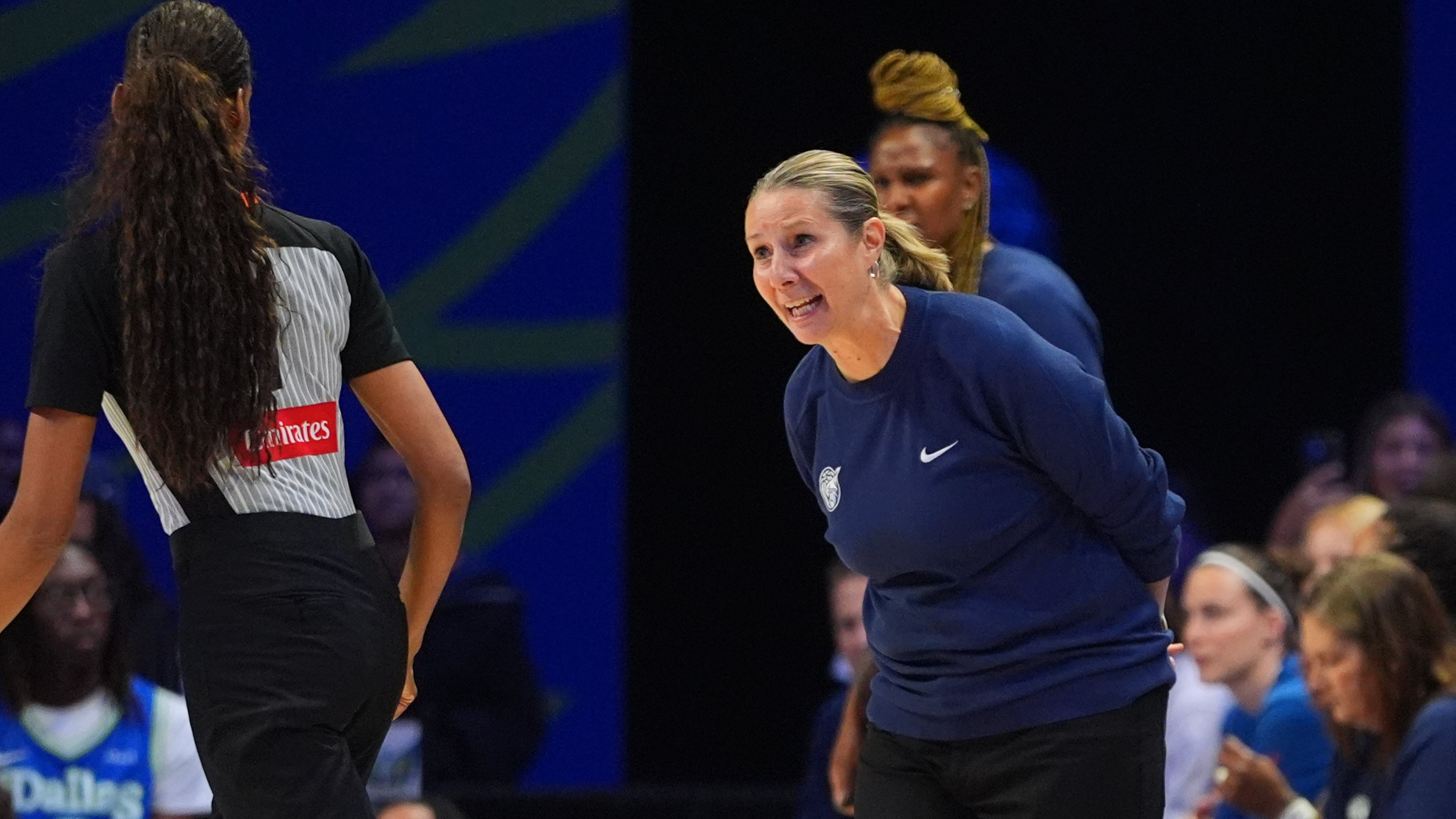 Minnesota Lynx head coach Cheryl Reeve, right, questions a call during the second half of a WNBA basketball game against the Dallas Wings in Arlington, Texas, Sunday, June 28, 2026. (AP Photo/LM Otero)
