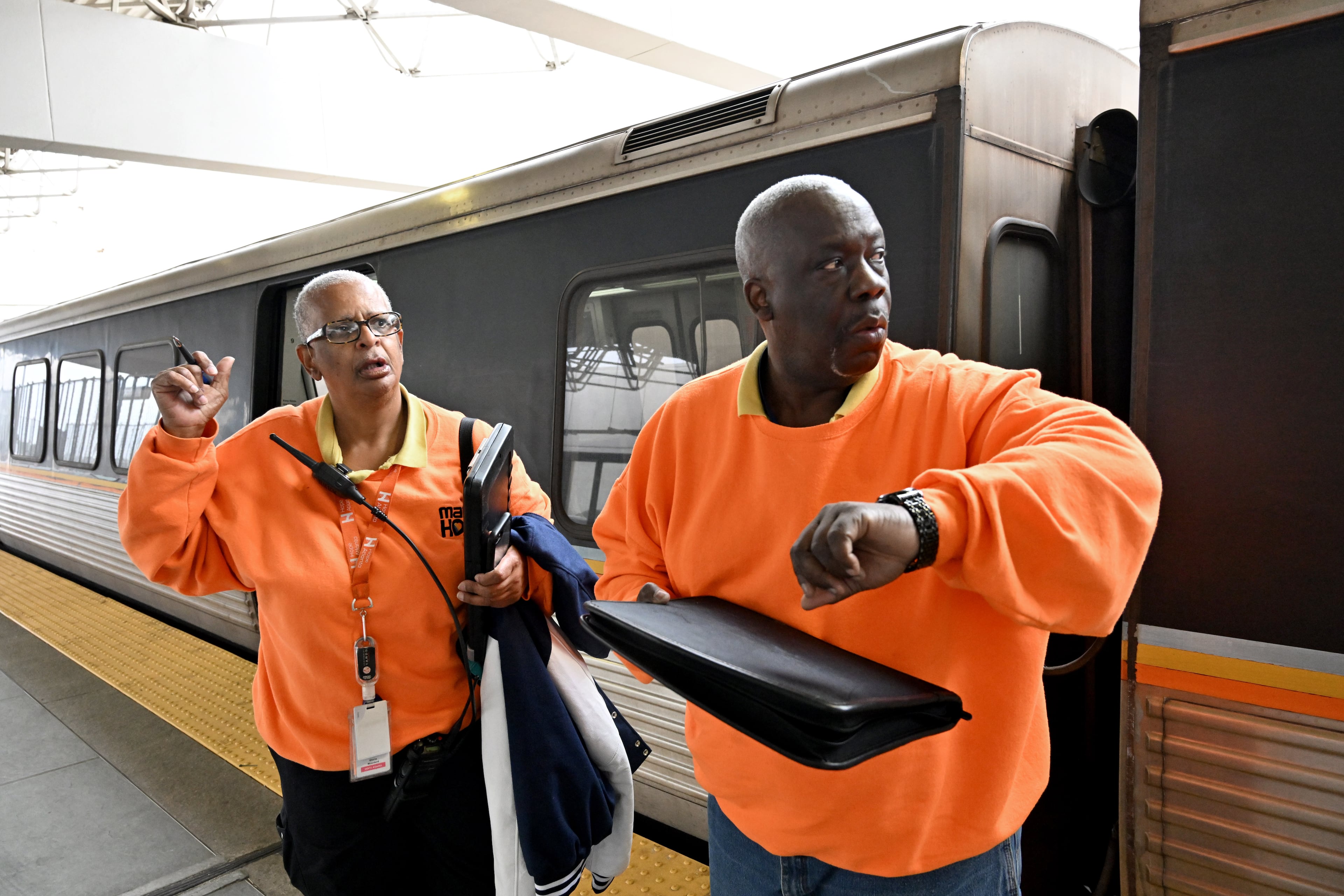 MARTA HOPE case managers Gloria Woodard (left) and Vinson Allen discuss their plan as they move through Airport Station looking for clients who may need assistance on Tuesday, March 3, 2026, in Atlanta. (Hyosub Shin/AJC)