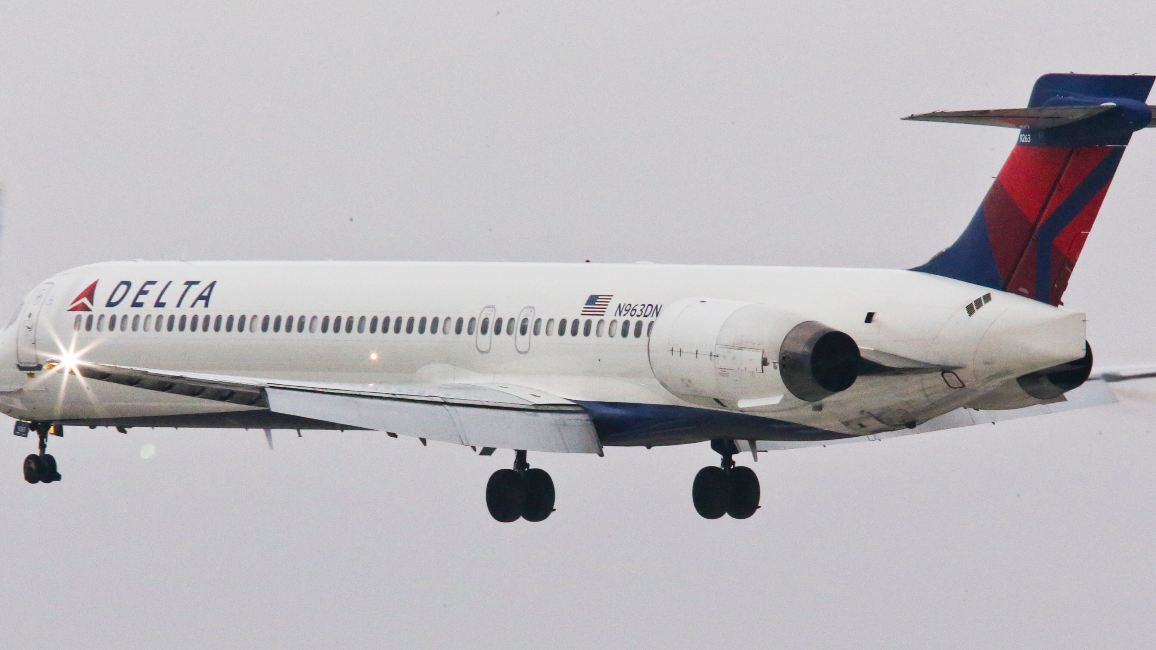 Secondary photo - January 14, 2015 Hartsfield-Jackson International Airport: A Delta jst takes off past the control tower Wednesday, Jan. 14, 2015. Hartsfield-Jackson International Airport has lost one of its two titles for world's busiest airport, with Chicago O'Hare taking the title for the most flights, according to year-end data from Flight Aware. Atlanta still carries millions more passengers, but for many years it held both titles. The decline in takeoffs and landings in Atlanta came as Delta Airlines retires regional jets and replaces them with larger planes, while Southwest Airlines cut back on AirTran flights here. JOHN SPINK / JSPINK@AJC.COM