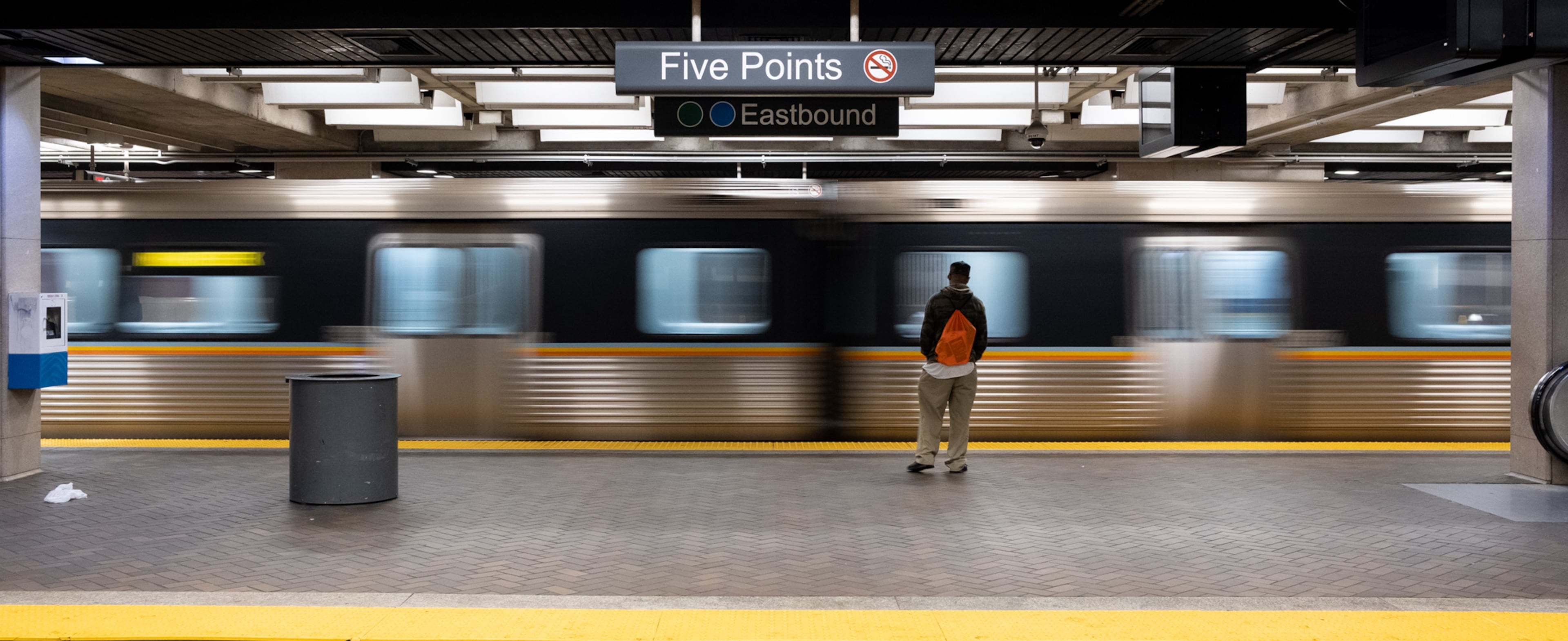 200320-Atlanta-A lone passenger waits on an arriving train at the Five Points MARTA station during rush hour Friday morning March 20, 2020. MARTA rail ridership has dropped off dramatically with the coronavirus pandemic. Ben@BenGray.com for the Atlanta Journal-Constitution