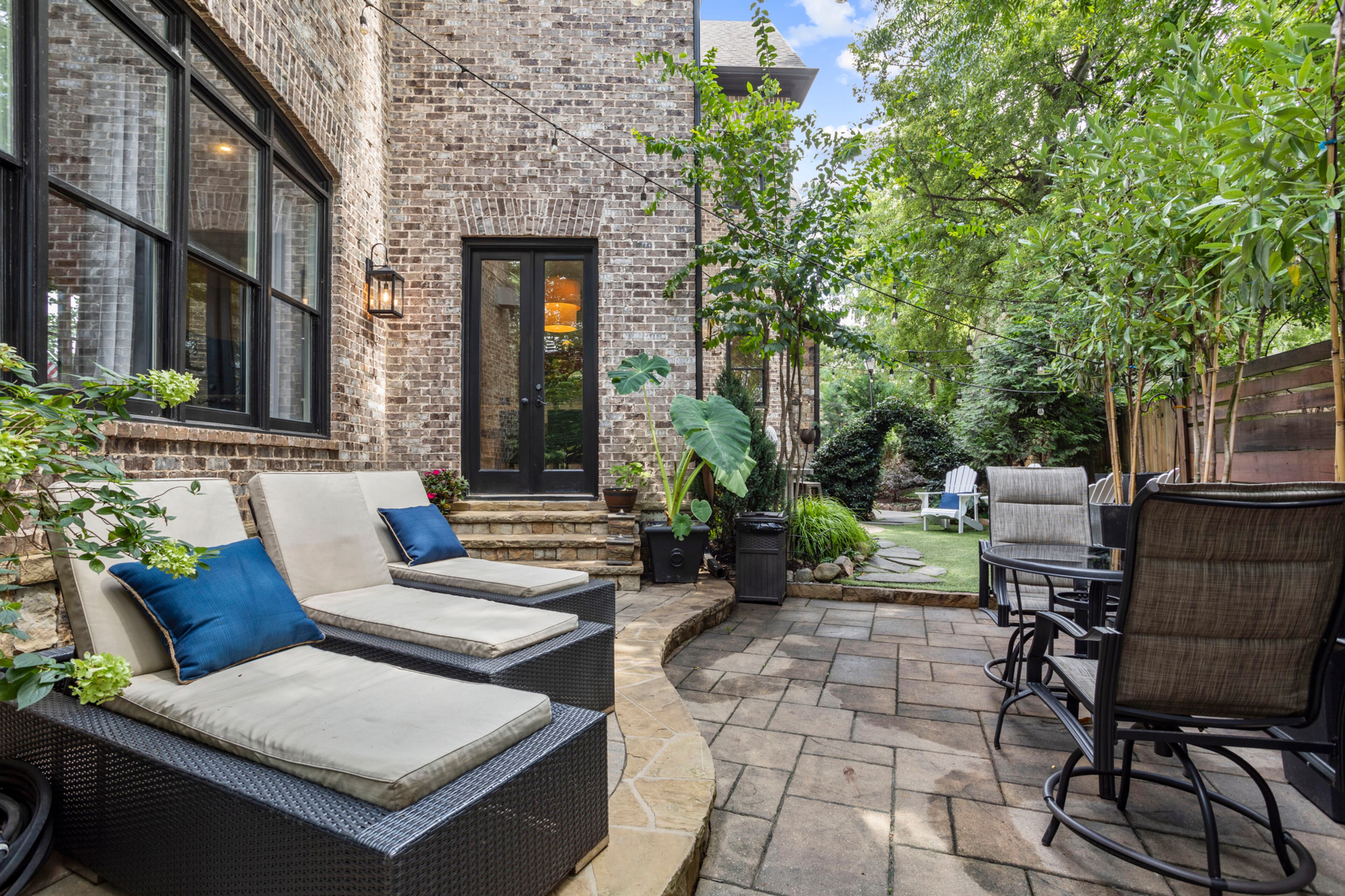 Huge rear deck, magazine-worthy landscaping. Text by Justin Longenbach