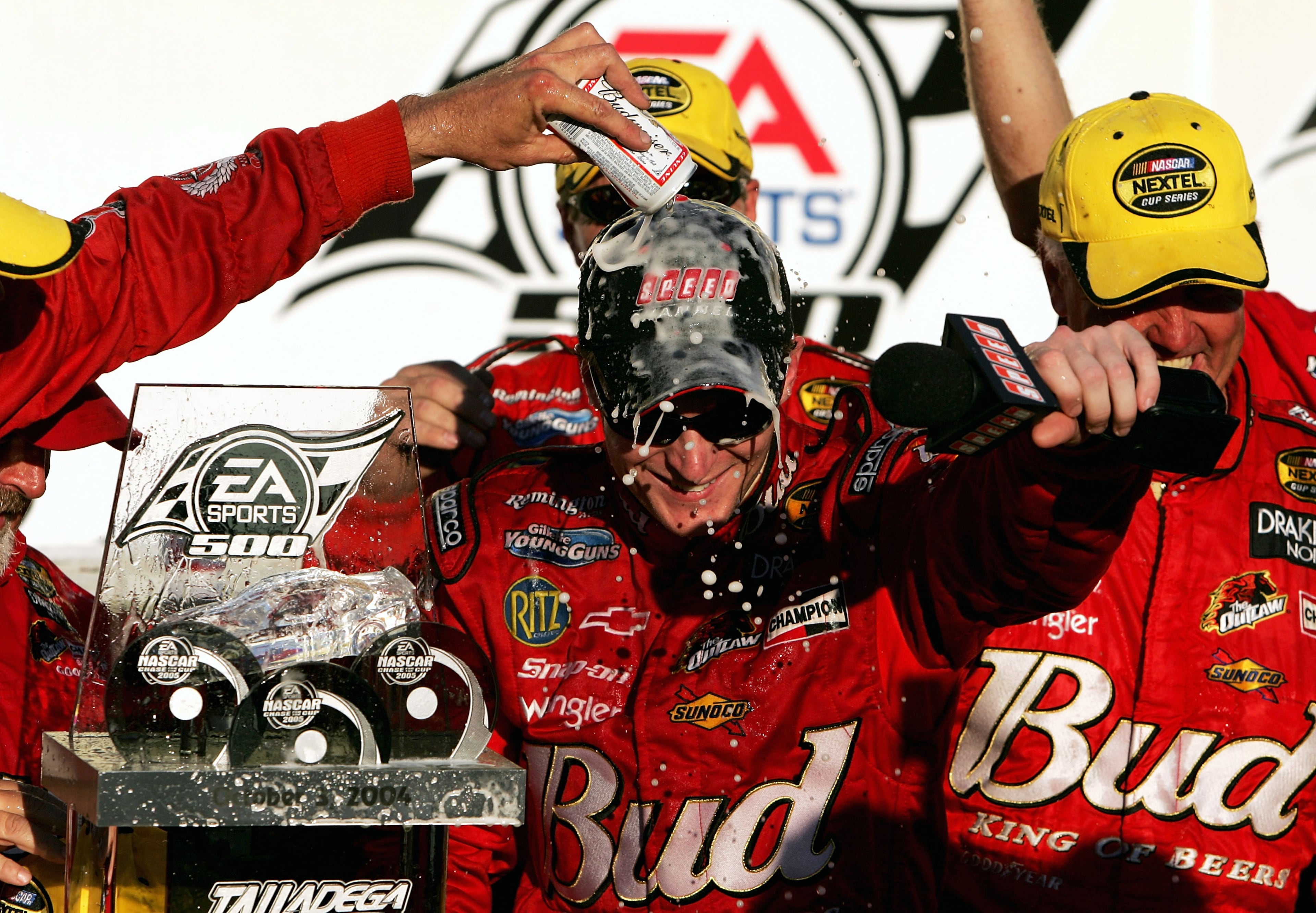 TALLADEGA, AL - OCTOBER 3: Dale Earnhardt Jr. celebrates in victory lane after winning the NASCAR Nextel Cup EA Sports 500 on October 3, 2004 at Talladega Superspeedway in Talladega, Alabama. (Photo by Jonathan Ferrey/Getty Images)